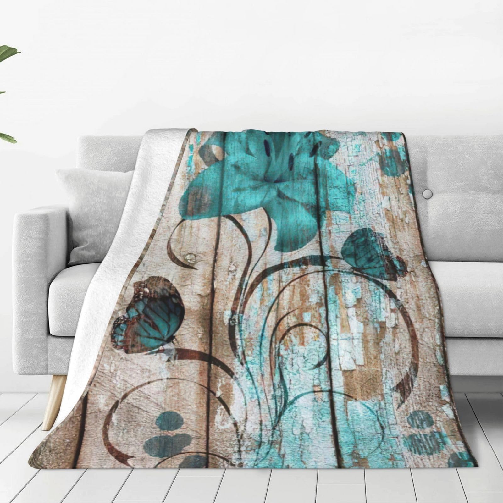Couverture polaire douce et thermorégulatrice à motif floral bleu sarcelle