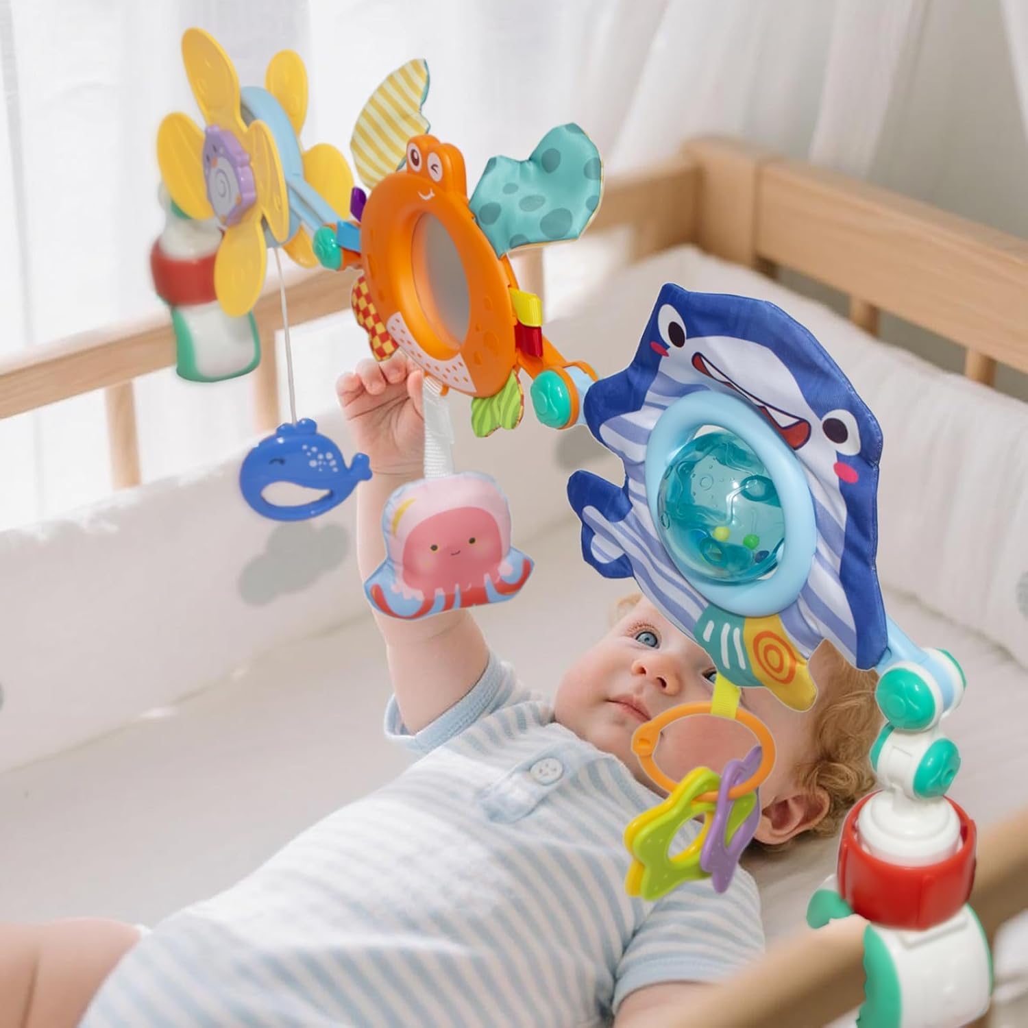 Arco Passeggino, Gioco Passeggino Neonato, Arco da Viaggio per Culla con Sonaglio, Regolabile e Pieghevole, Giocattoli Sensoriali per Buttafuori, seggiolino Auto (Arancia)