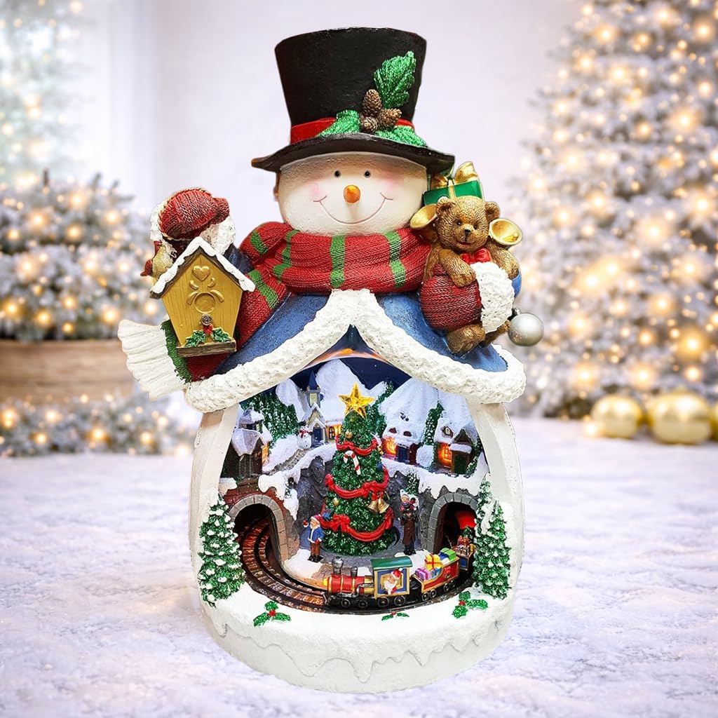 MOMENTS IN TIME Snowman with Animated Christmas Village Scene LED Lighted Musical Holiday Decoration with Moving Train Adapter Included 18.7” Tall Festive Home Decoration