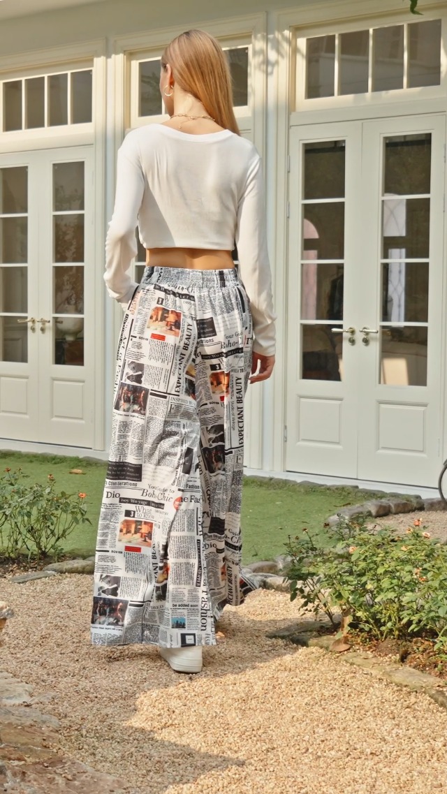 WDIRARA Women's Newspaper Print Wide Leg Pants Black | Maximalist