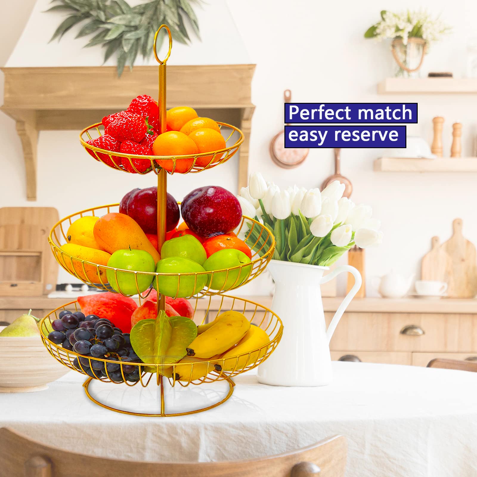 Three-tier metal fruit basket with seasonal fruits displayed