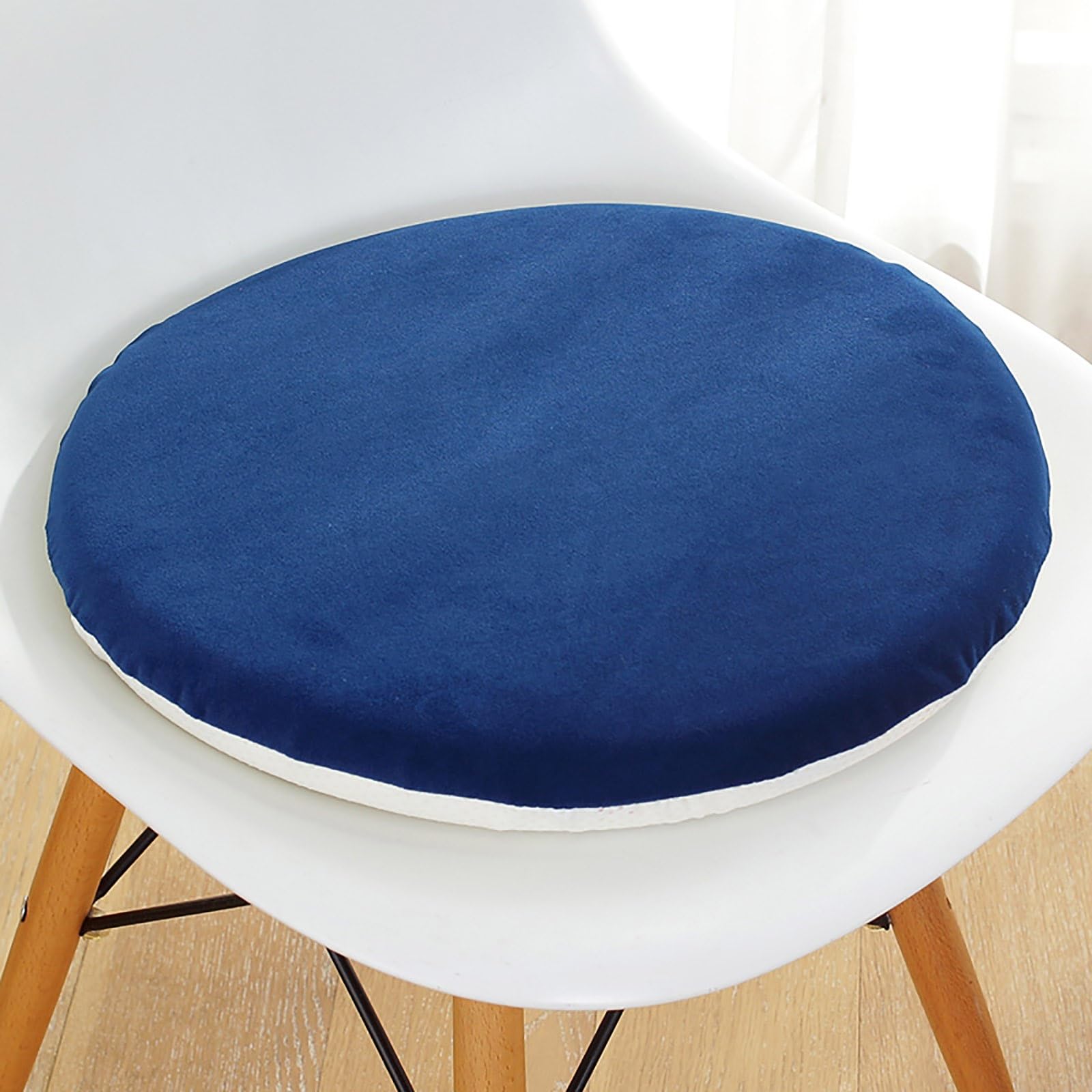 Coussin en mousse à mémoire de forme rond contre les assises dures