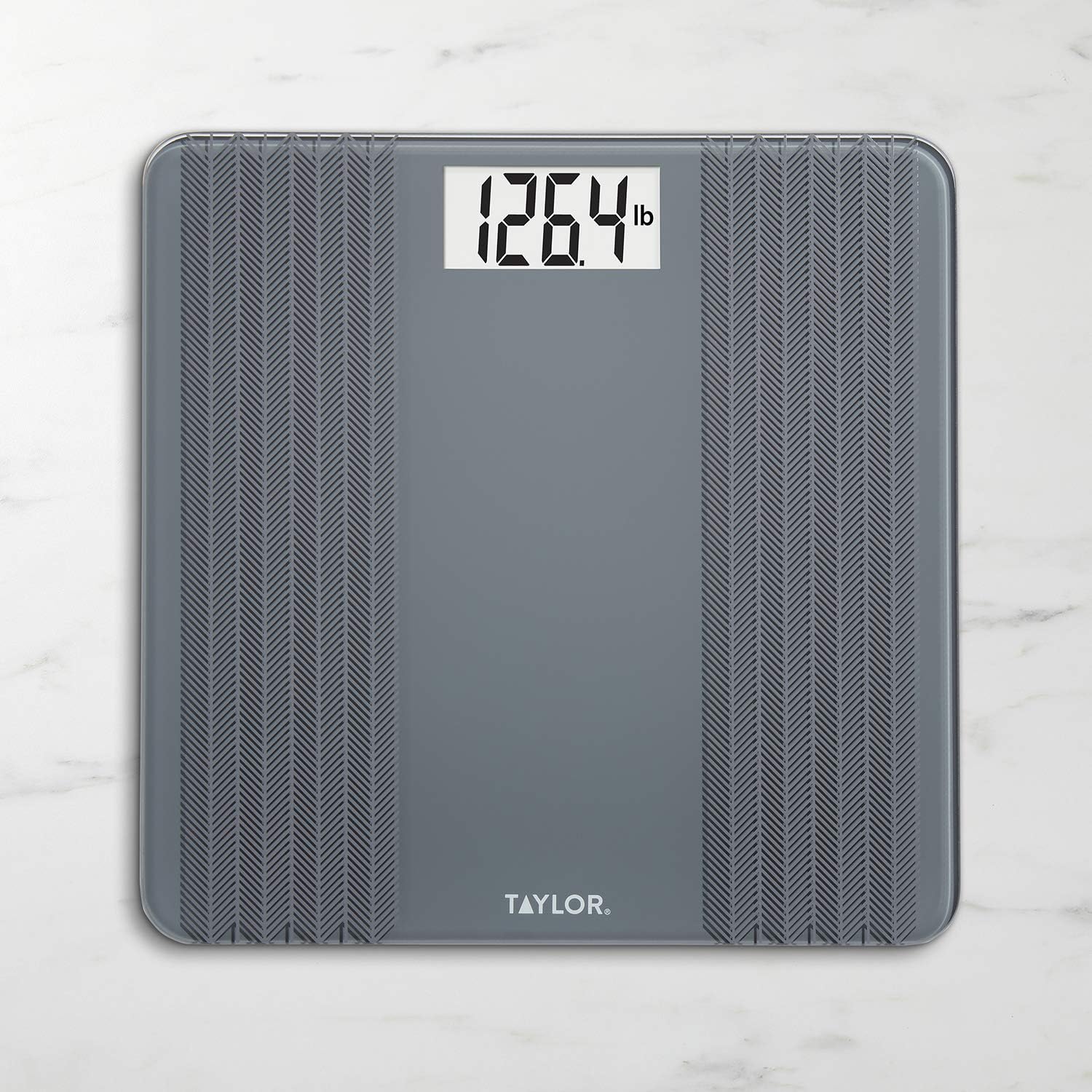 Taylor Digital Bathroom Scale displaying a weight reading
