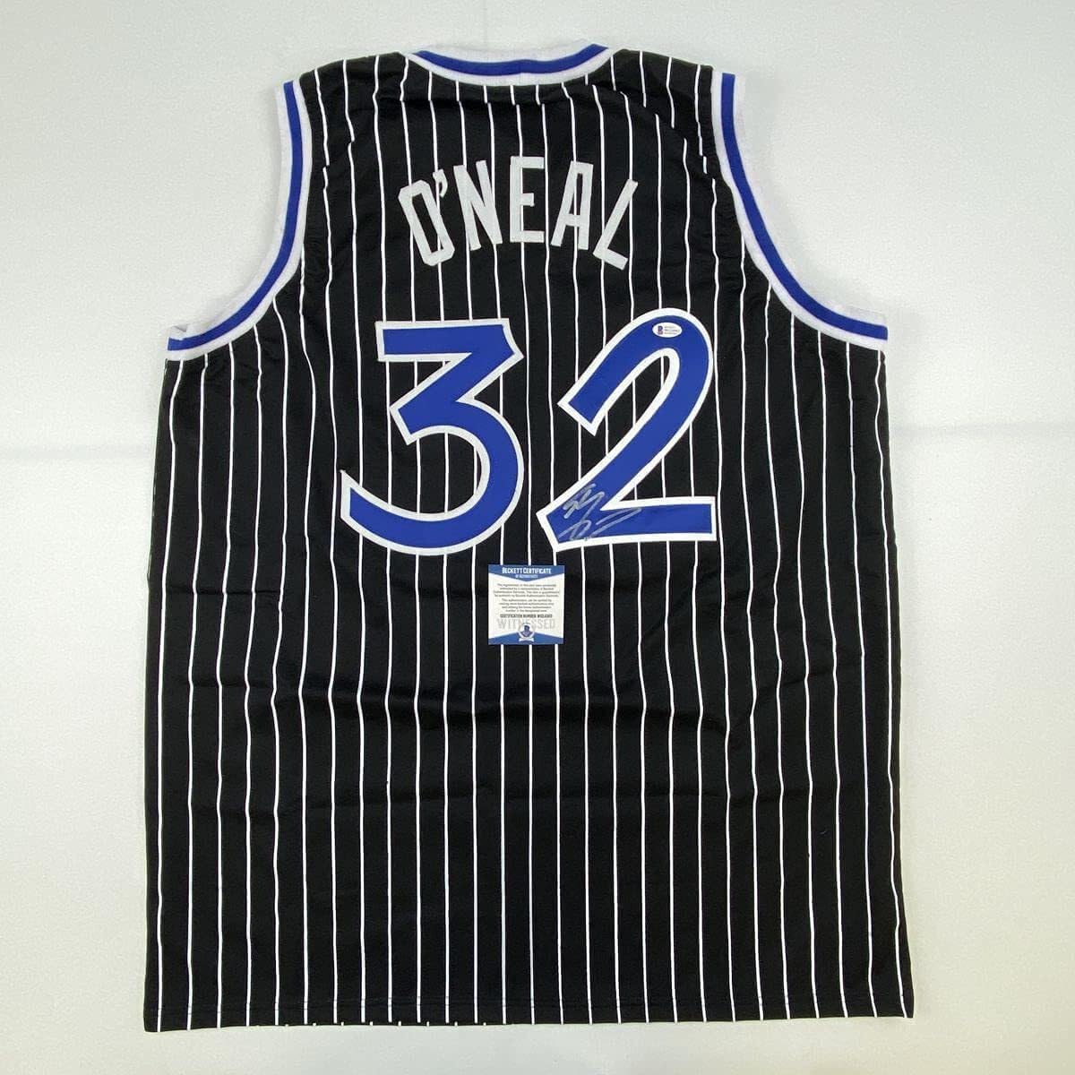Autographed/Signed Shaquille Shaq O'Neal Orlando Black Pinstripe Basketball Jersey Beckett BAS COA
