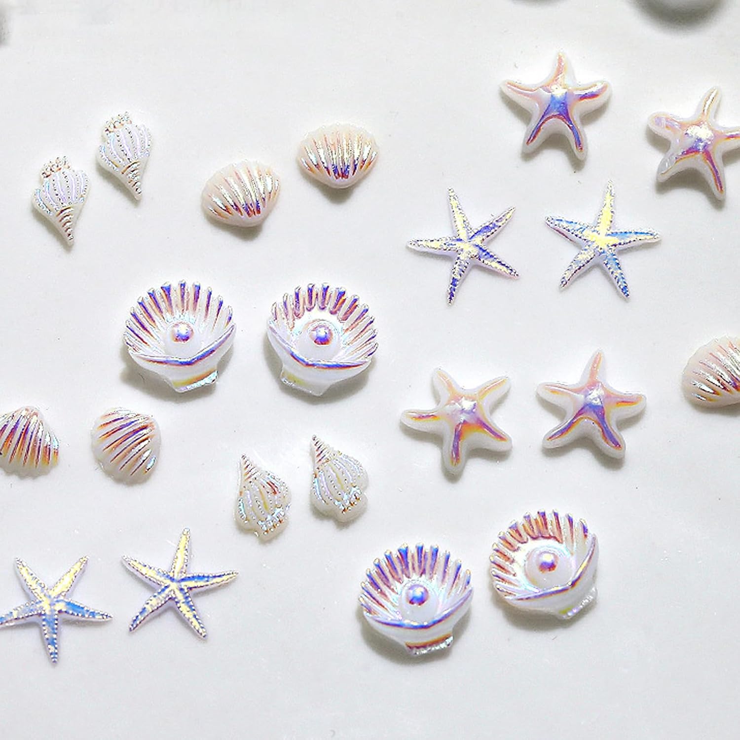 100Pcs Ocean Theme Nail Charms White Aurora Iridescent Resin Nail Decorations Starfish Seashell Conch Nail Gems for Acrylic Nails Gel Nails DIY Women Manicure Tips Supplies