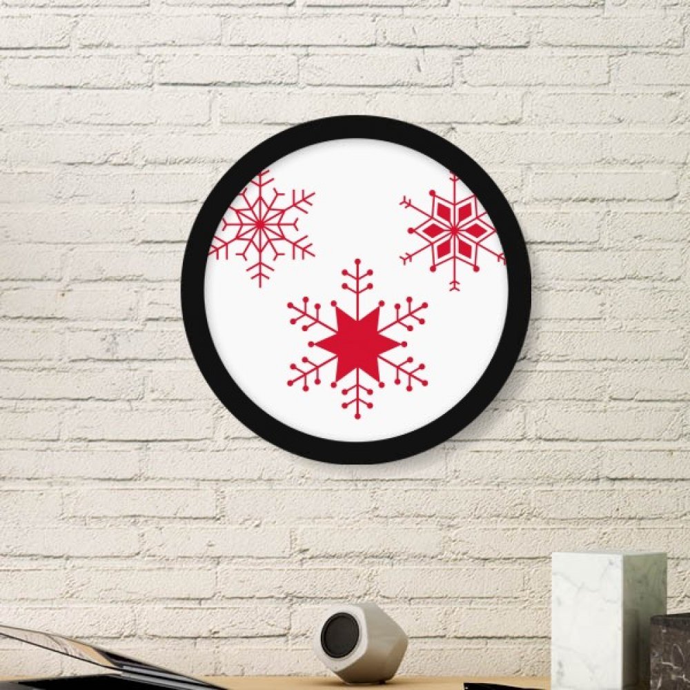 Cadre Noël flocon rouge pour égayer un mur blanc sans travaux