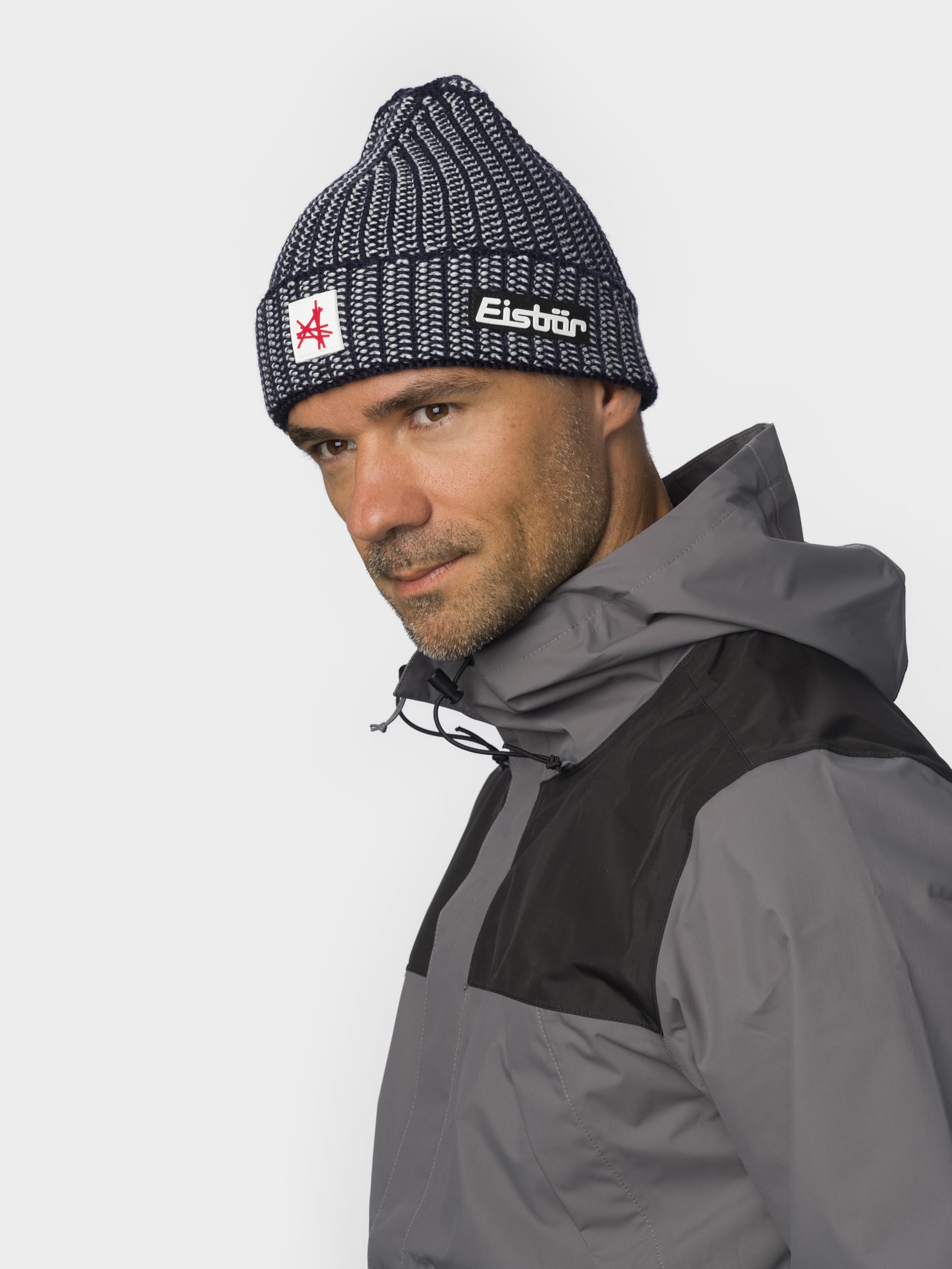 Eisbär Mütze Herren & Damen Sorrak Ski Austria - Merino Wintermütze Unisex mit Fleece schützt vor Kälte und Wind - Strickmütze atmungsaktiv thermoregulierend Wintermütze warm Skimütze Haube