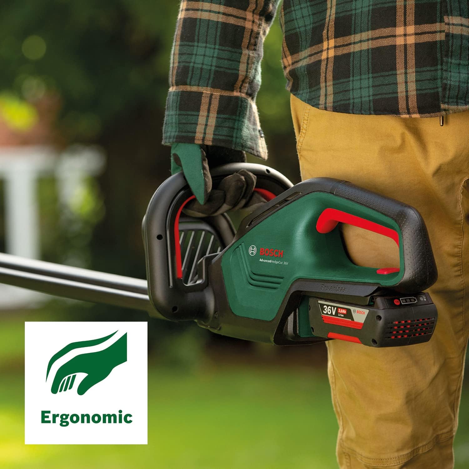 User holding Bosch hedge trimmer, demonstrating ergonomic design