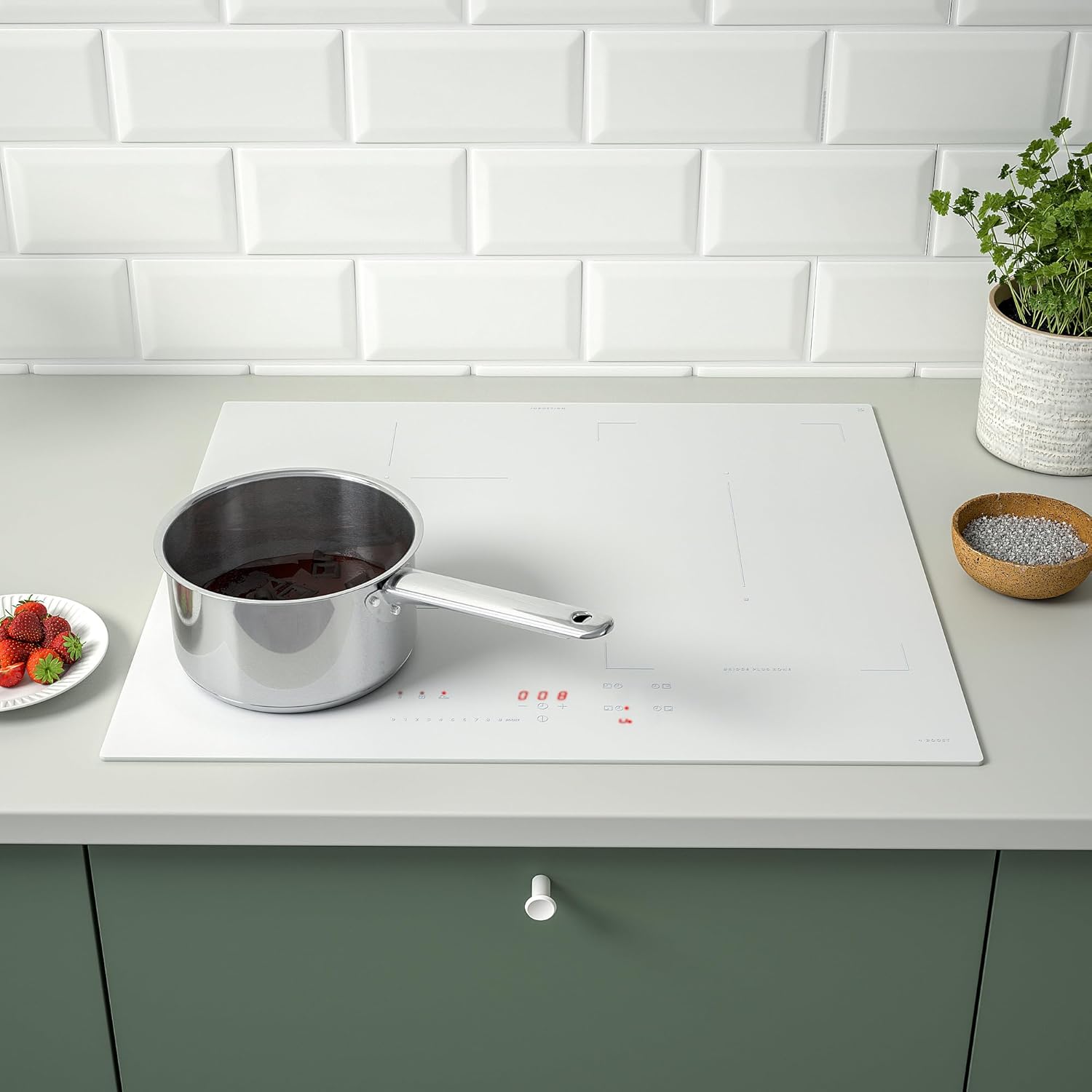 ProTuning KOLSTAN Induction Hob in use with a saucepan