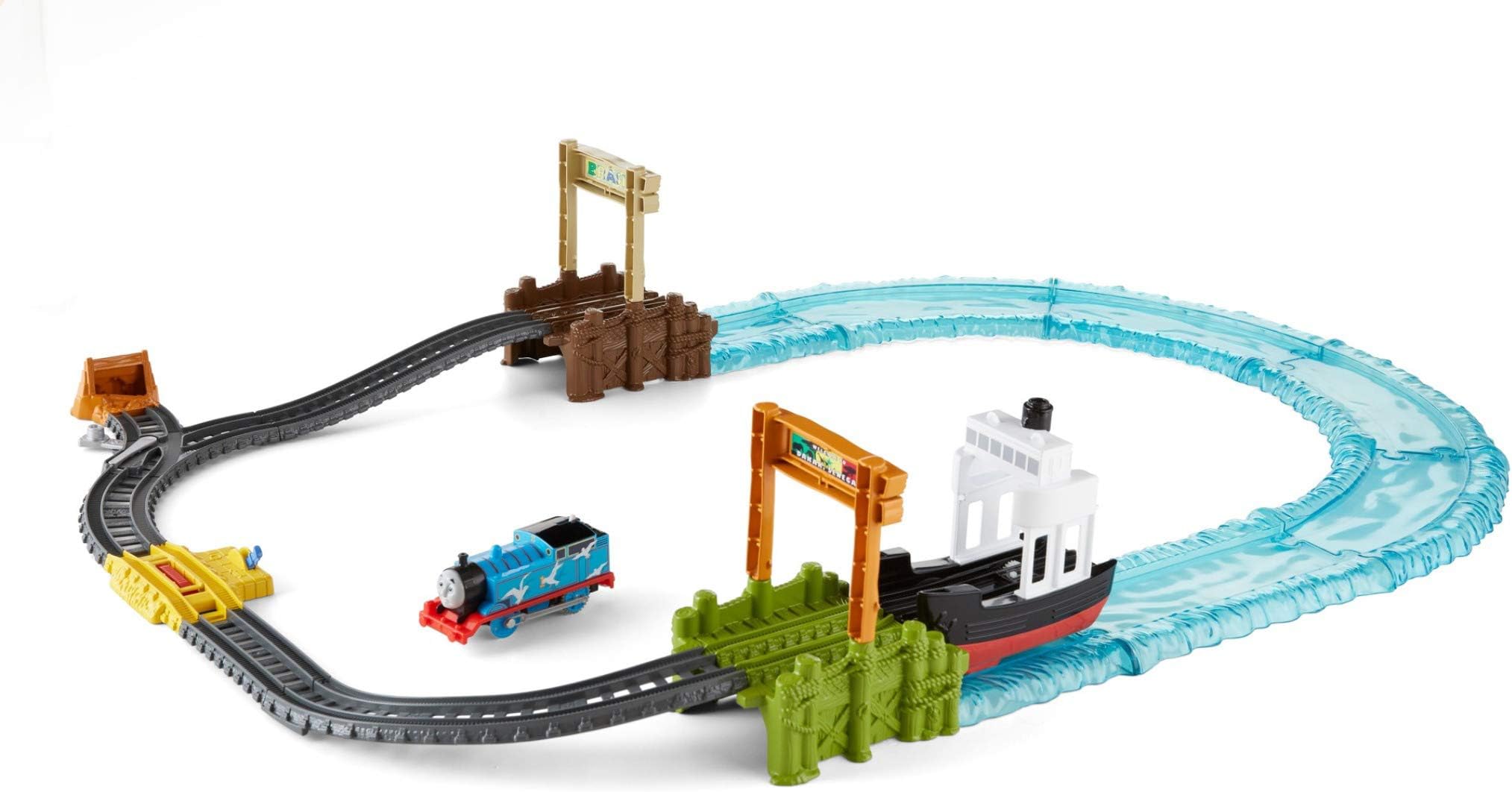 This Thomas & Friends motorized toy train set takes Thomas from the tracks to the sea as he sails in a boat on a global adventure!, FJK49
