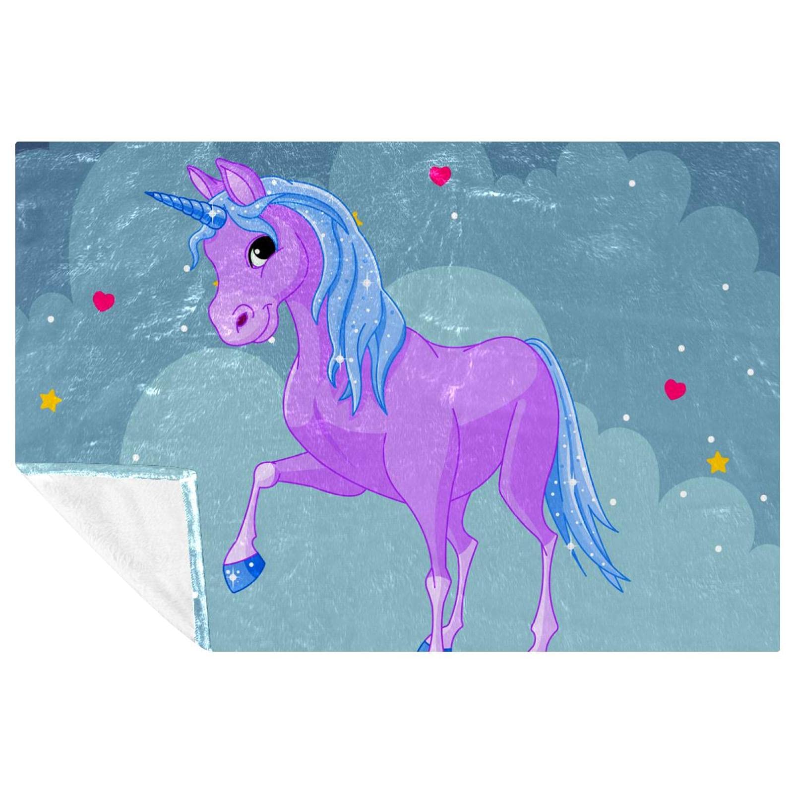 Couverture licorne bleue 150x100 cm pour des moments cocooning sur le canapé et en pique-nique