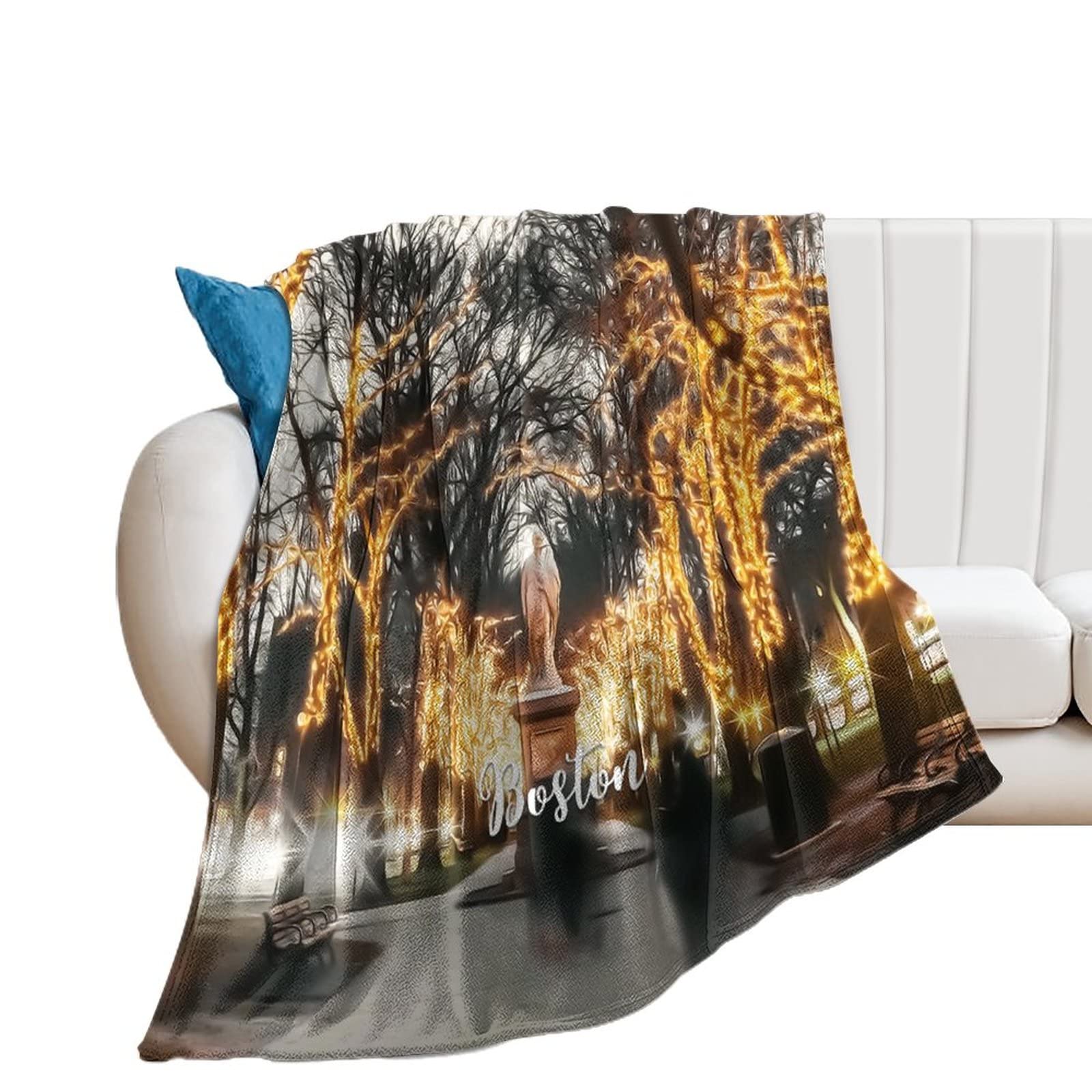Couverture flanelle Boston contre les frissons du soir sur le canapé