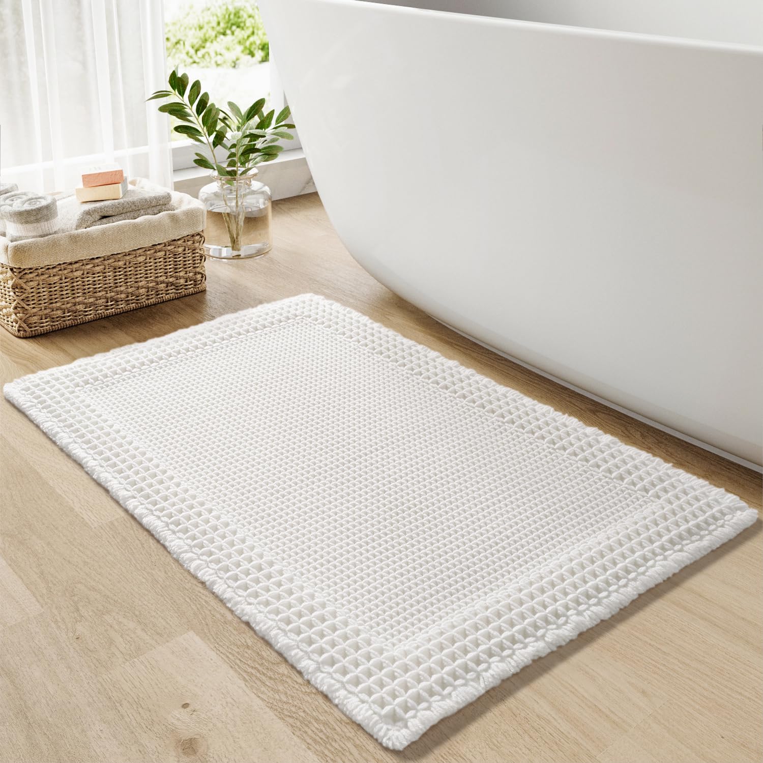 RESARE Waffle Bath Mat for Bathroom, Super Absorbent Bathroom Rugs Non Slip Machine Washable, Ultra Soft Quick Dry Boho Bath Rugs with Tassels for Floor, Upgraded Bordered Design, 24"x36" White