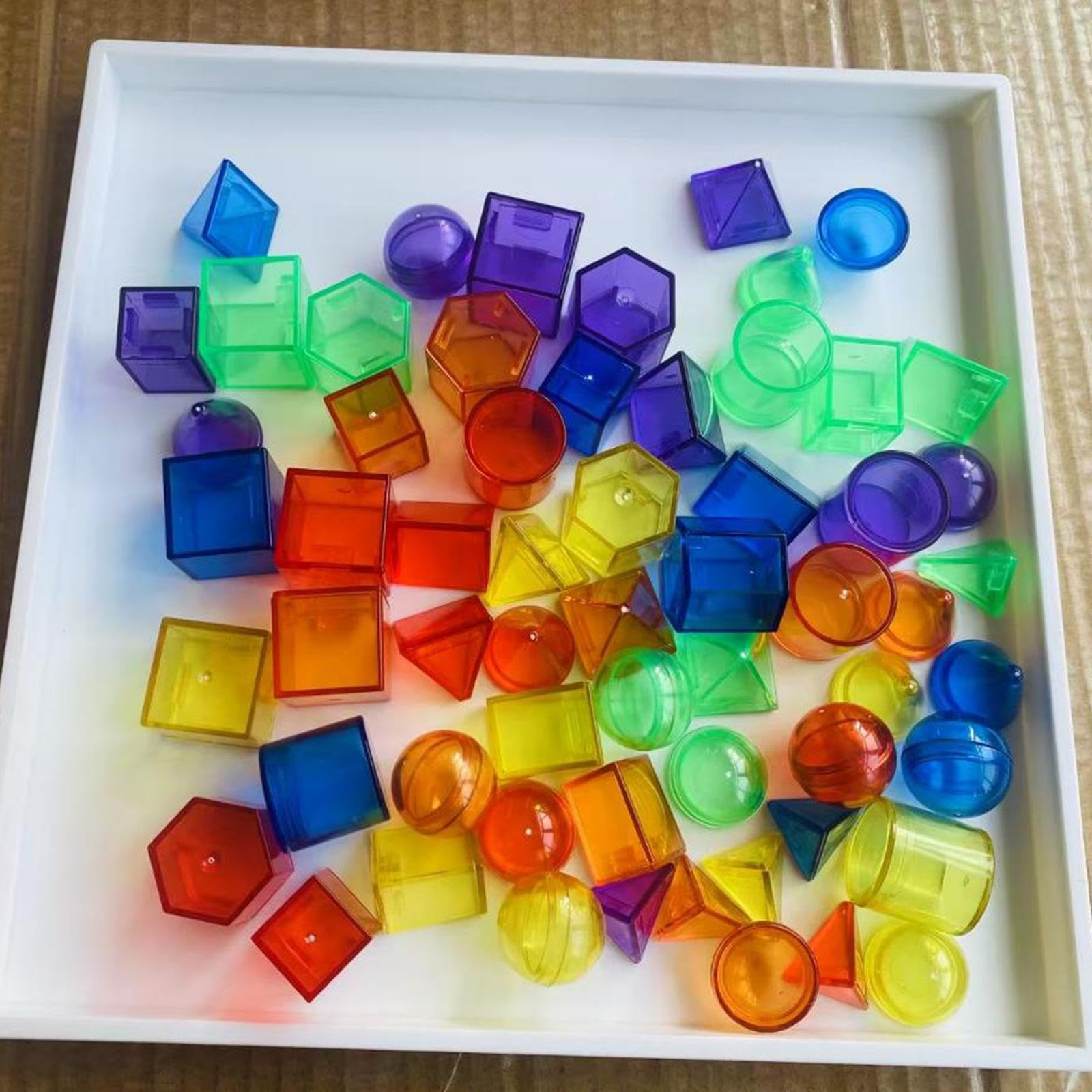 Qianly 100 Bloques Geométricos Translúcidos con Patrones para Niños. Material Didáctico Colorido para Profesores.