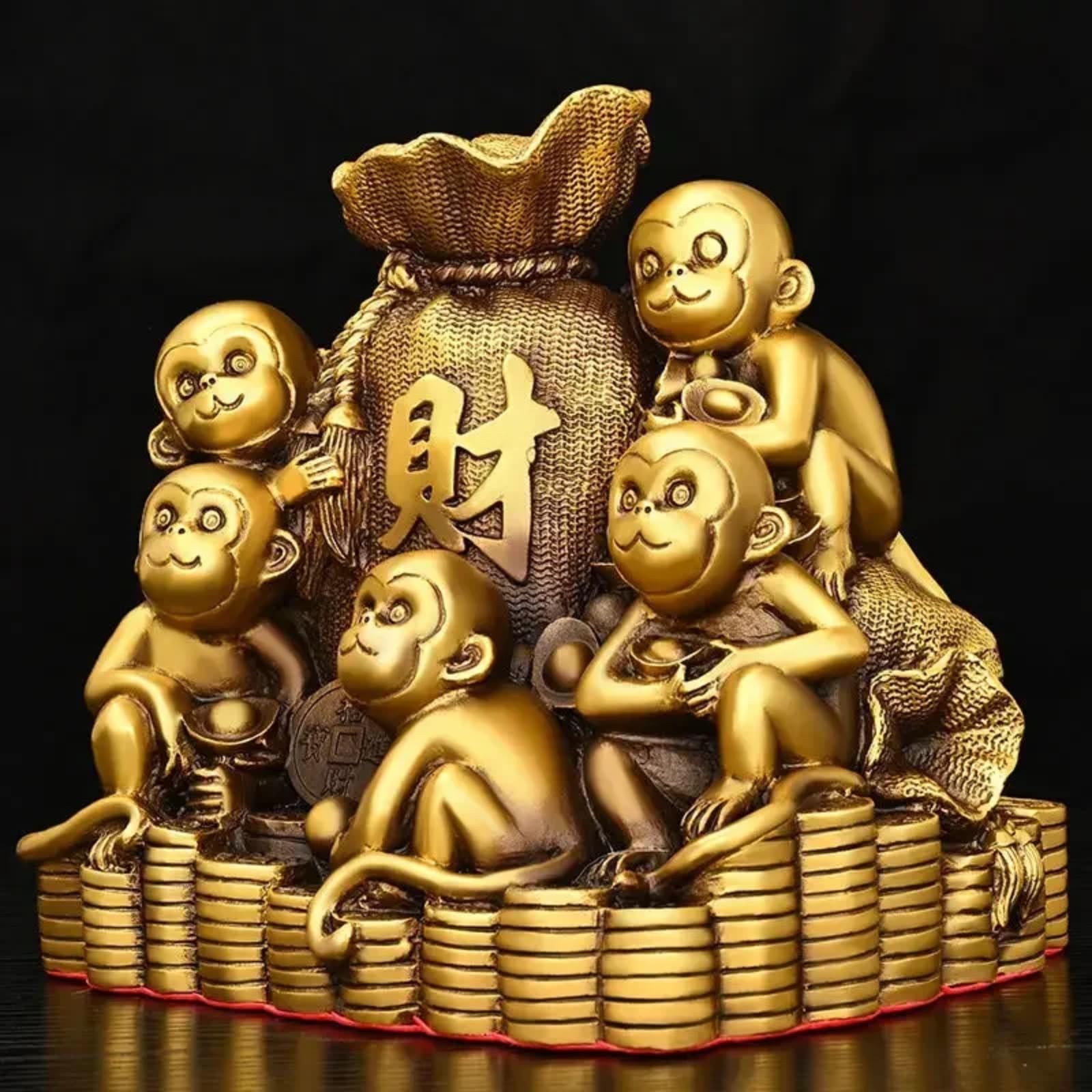 Mascotte en cuivre singe doré de 17 cm pour harmoniser l'ambiance de votre salon