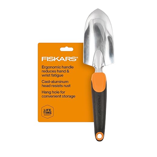 Fiskars Ergo Garden Trowel for Digging and Planting, Heavy Duty Gardening Hand Tool with Hanging Hole