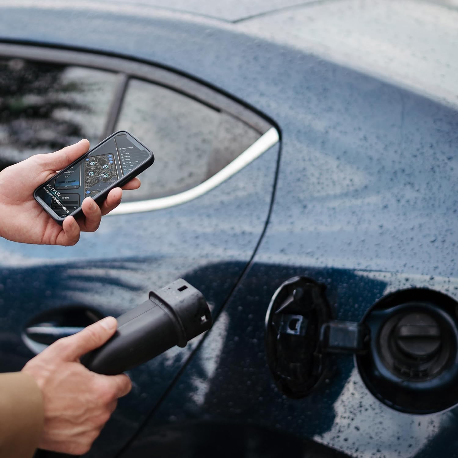 User interacting with EV Life app on smartphone while charging