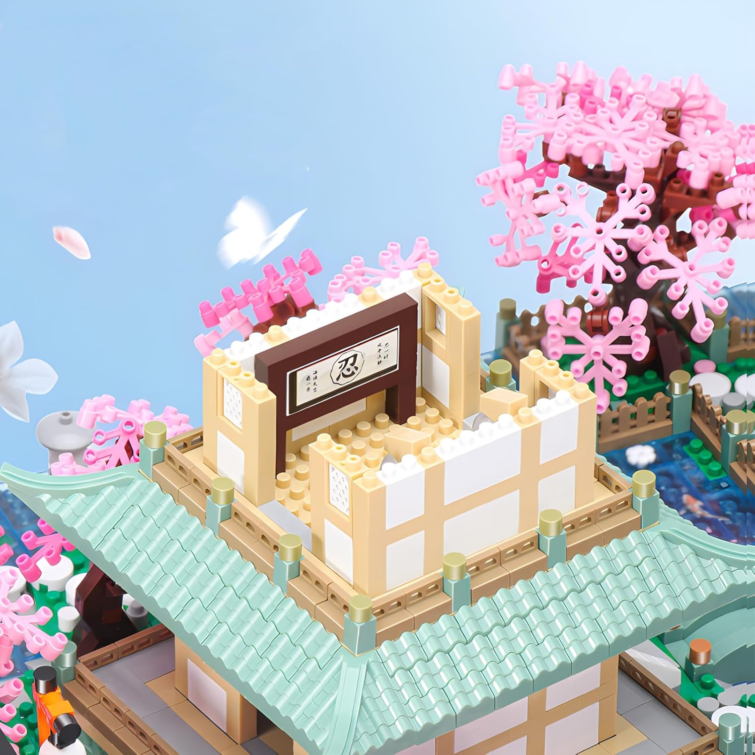 Close-up of the layered display section of the HJPLPXH Cherry Blossom Tree House Micro Building Block Set, showing block connections.