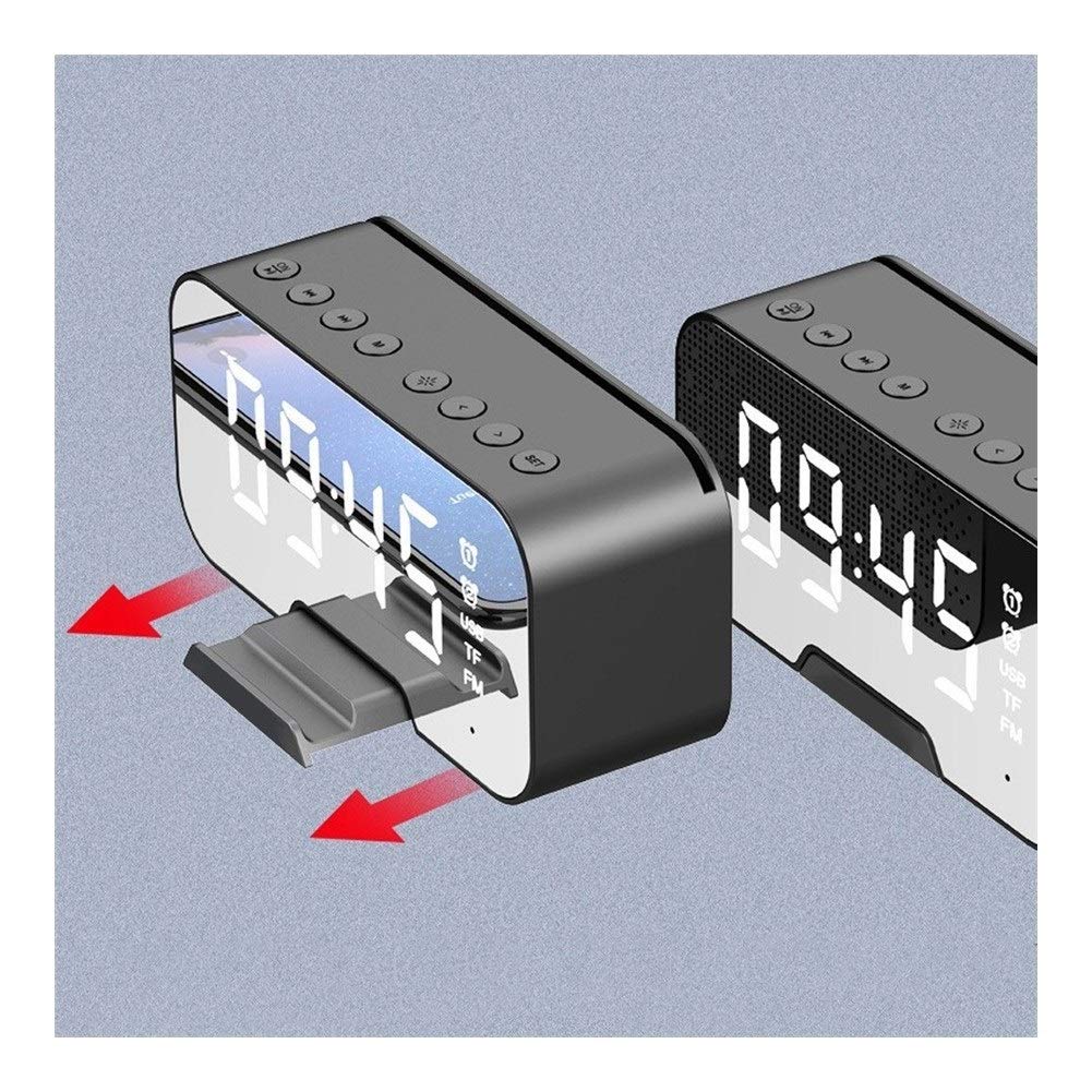 The EARISE/Yalan Shi G-10 speaker with a smartphone being inserted into a slot on its side, indicating mobile phone support.