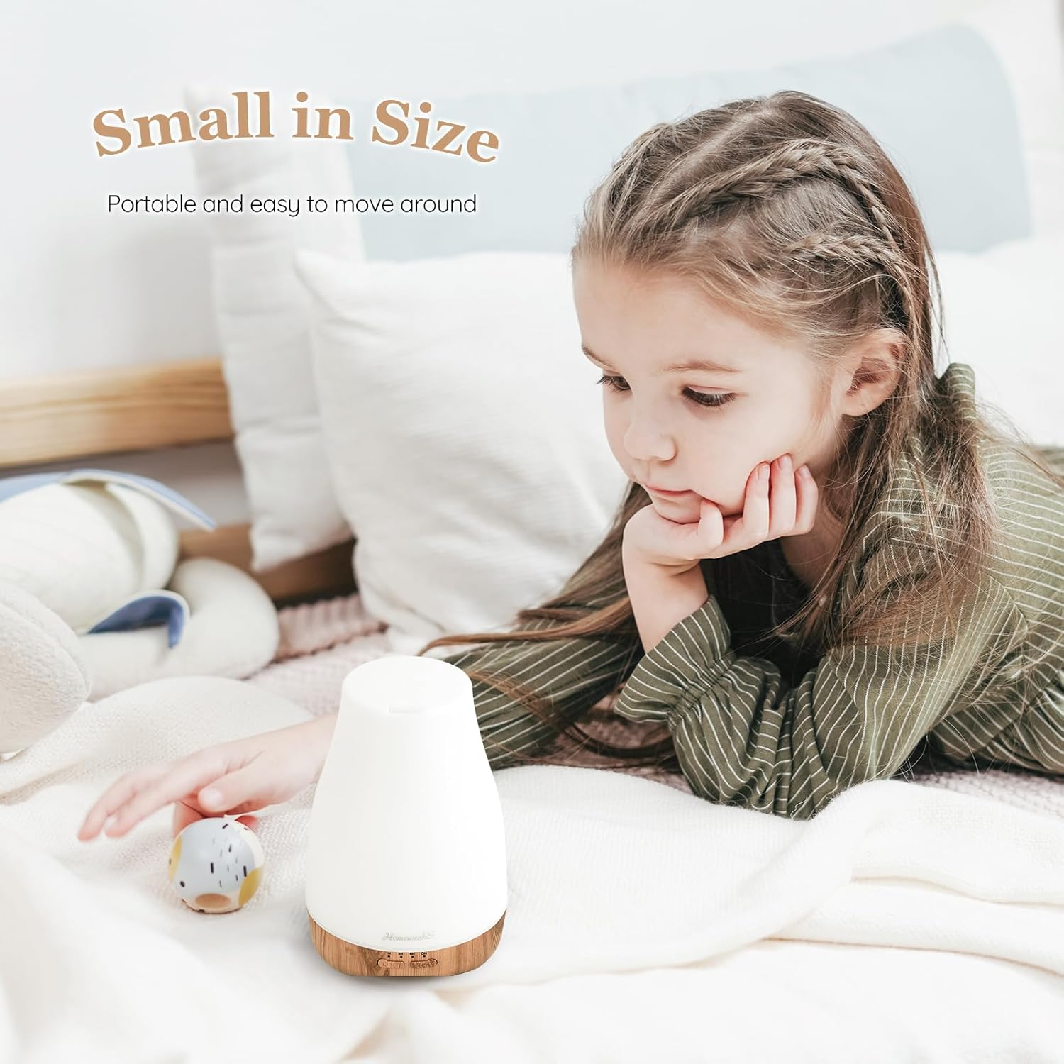 Child looking at a small Homeweeks diffuser