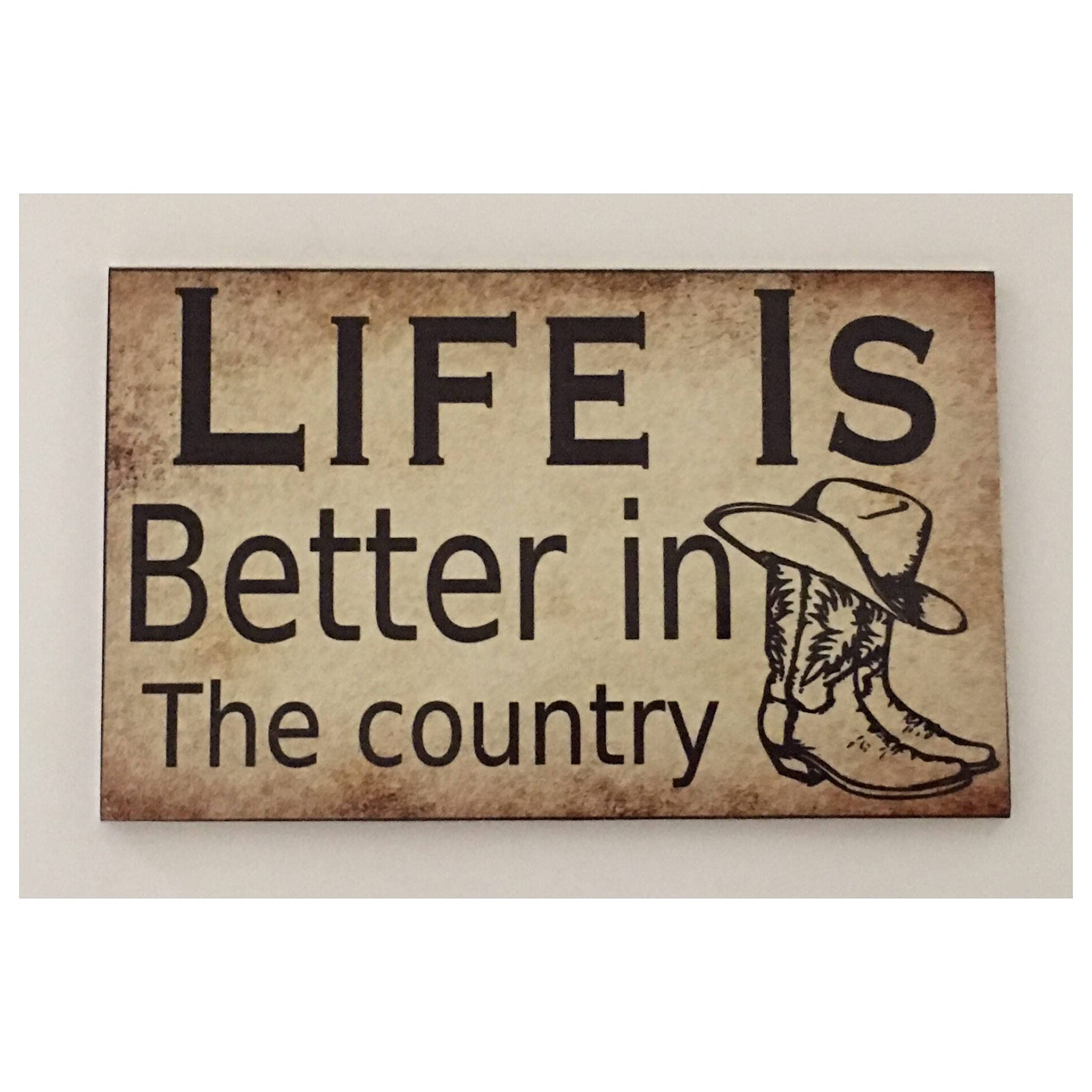Krouterebs New Life is Better in The Country Sign Timber Rustic Look Boots Cow Boy Girl Farm Country Metal Tin Sign for Home and Kitchen Bar Man Cave Cafe Garage Wall Decor 12x8 Inch
