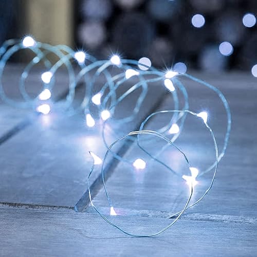 Vista 65 de Dazzle Bright Guirnalda de luces con pilas, 20 pies, 60 luces led, cable plateado, impermeables, decoraciones de Navidad, Día de San Patricio, Verde