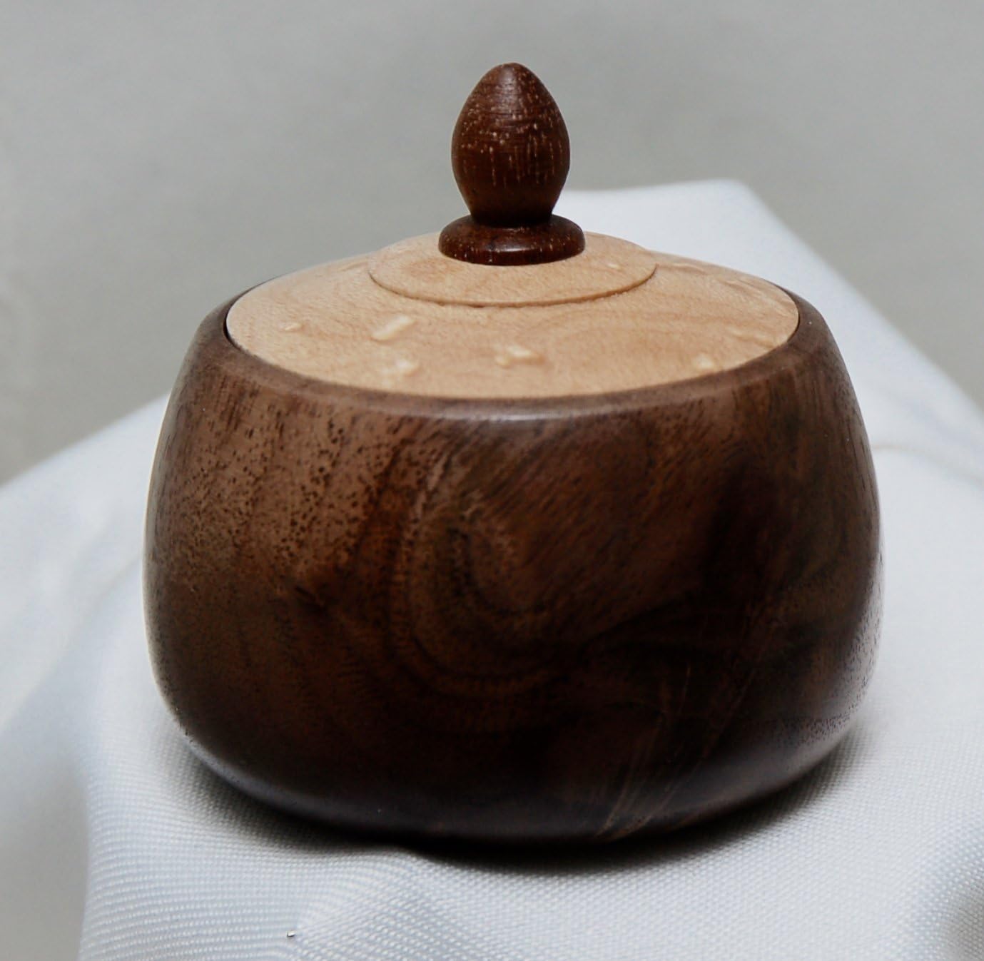 Walnut Wood lidded box. Handmade wood turning from walnut with bird's eye maple lid