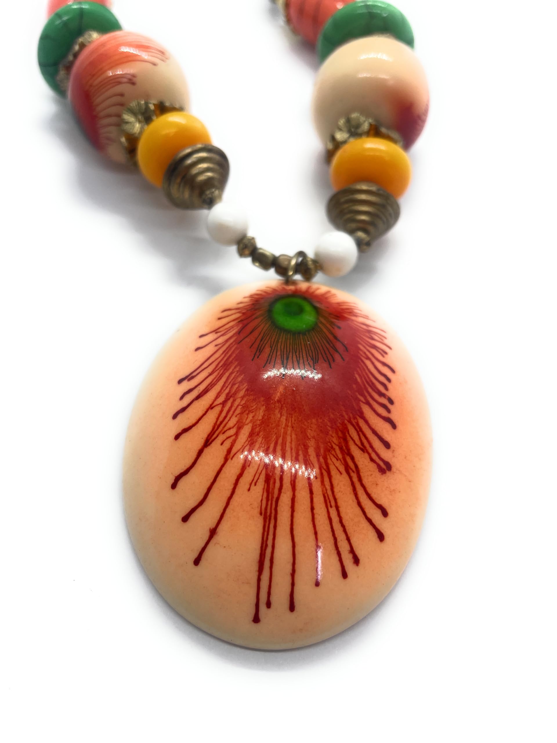 GenericPeacock print necklace in orange colour comes with elegent look and with earrings.a perfect match. Ancient antique jewellery style