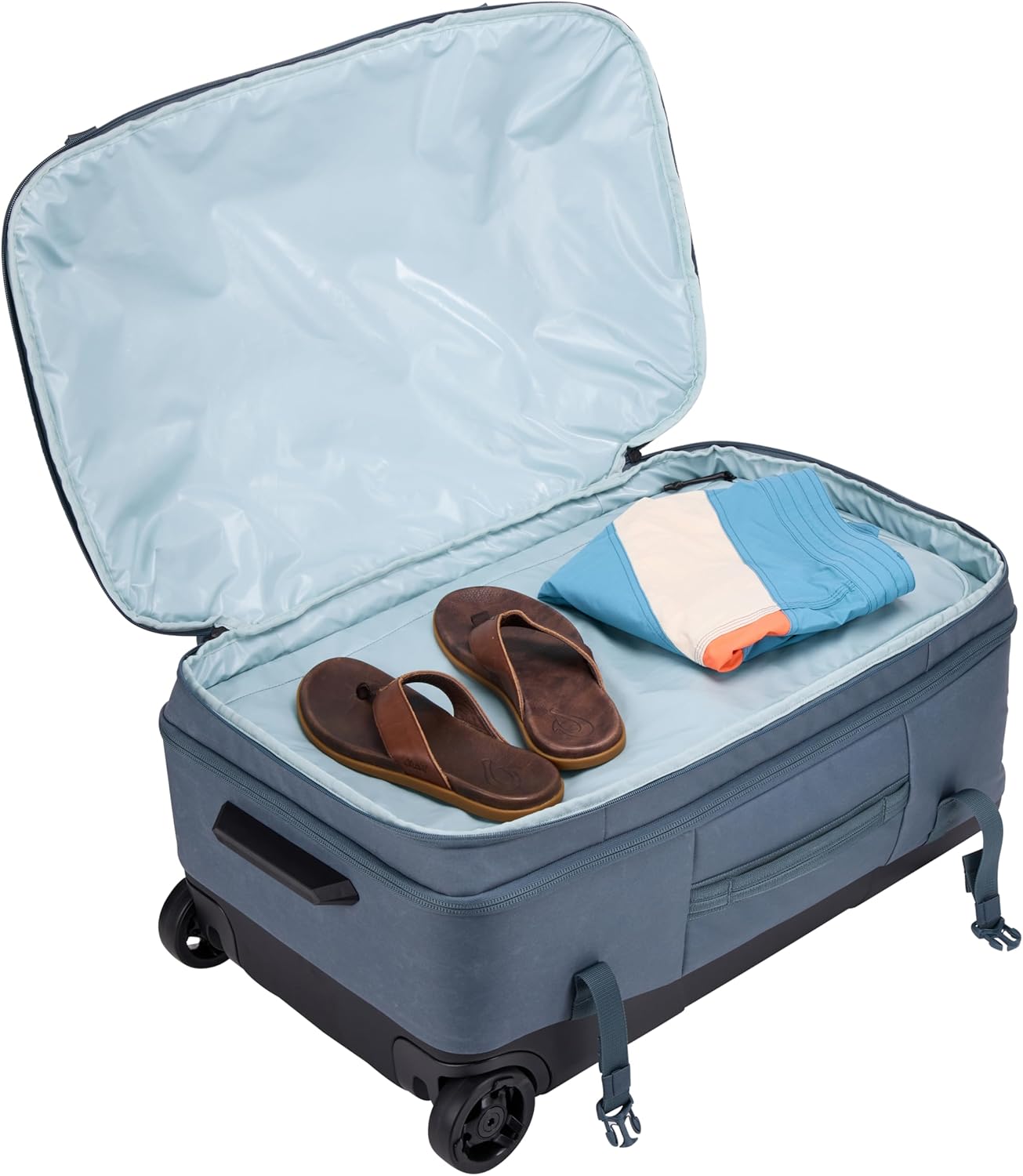 Thule Aion 70cm Wheeled Duffel - Wet/Dirty Storage Pocket - Smooth Rolling Wheels - Interior Compression Straps - Lockable Exterior Zippers - 100% Recycled PFC-Free Waxed Canvas Fabric
