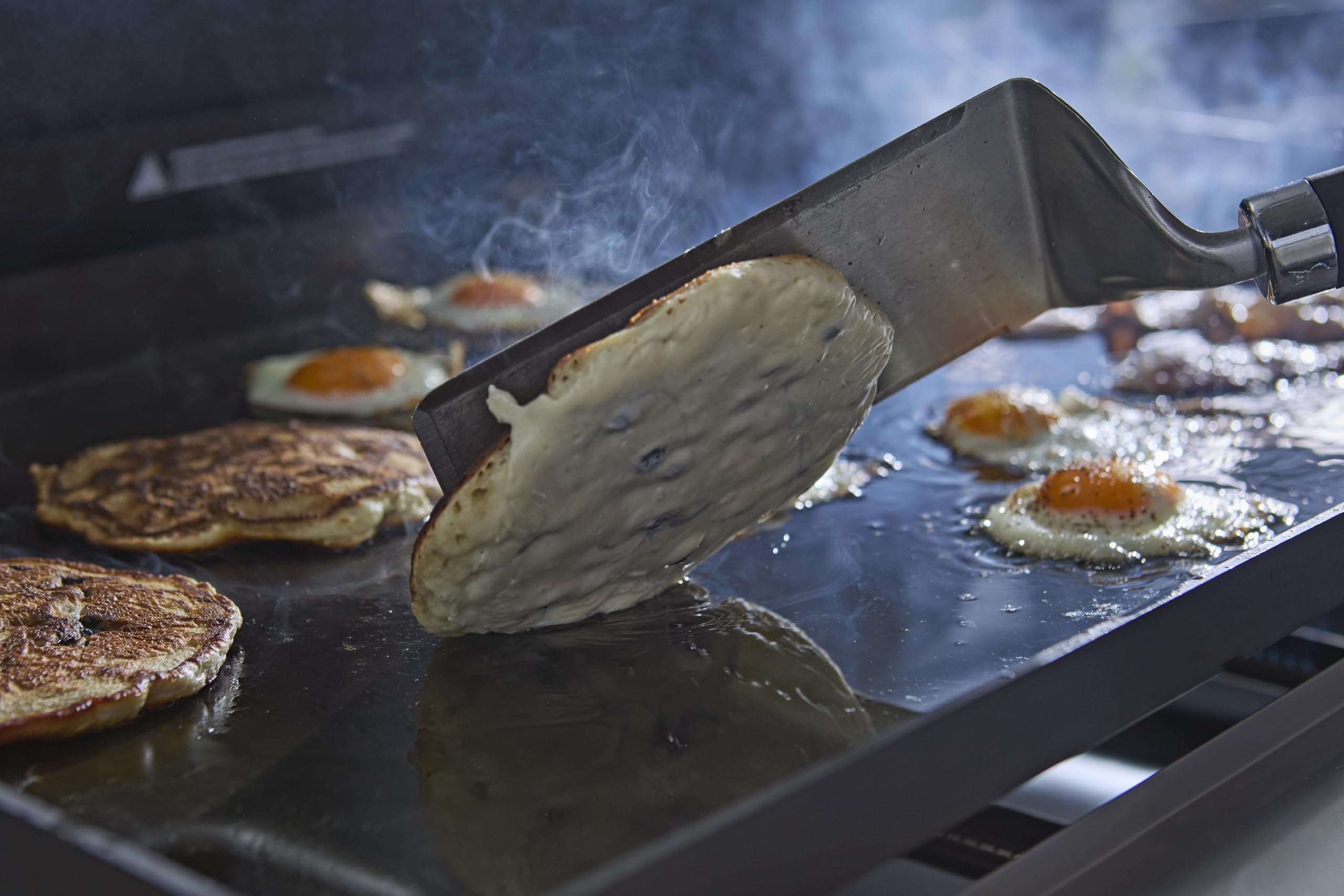 Weber Zestaw łopatek do płyt grillowych – Planchas, 2-częściowy, ze stali nierdzewnej, ze ściętą krawędzią przednią do łatwego przesuwania pod grillowanymi potrawami, kolor srebrny – czarny (3400424)