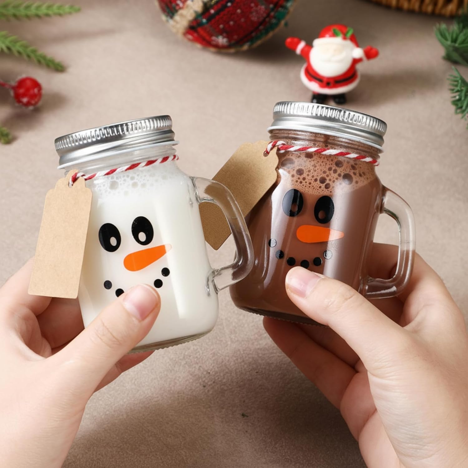 Mimorou 24 Pack 4oz Christmas Mini Mason Jars Snowman Mini Mason Jar Mugs with Handle Drinking Glasses Cups with Lids Wooden Spoons, Kraft Tags for Christmas Party Favors, Gifts, DIY Treats