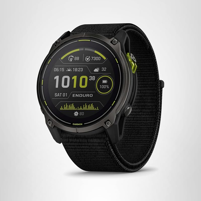 Garmin Enduro 3 ultraperformance GPS smartwatch with Carbon Gray DLC Titanium bezel and Black UltraFit Nylon Strap showing a detailed topographical map.