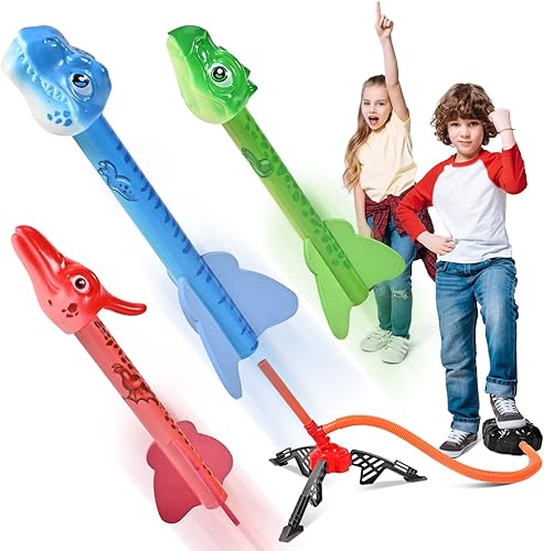 UUSTAR Lanzador de cohetes para niños con 3 dinosaurios de espuma, almohadilla de lanzamiento de pisotón, juguetes exteriores para niños de 4 a 8
