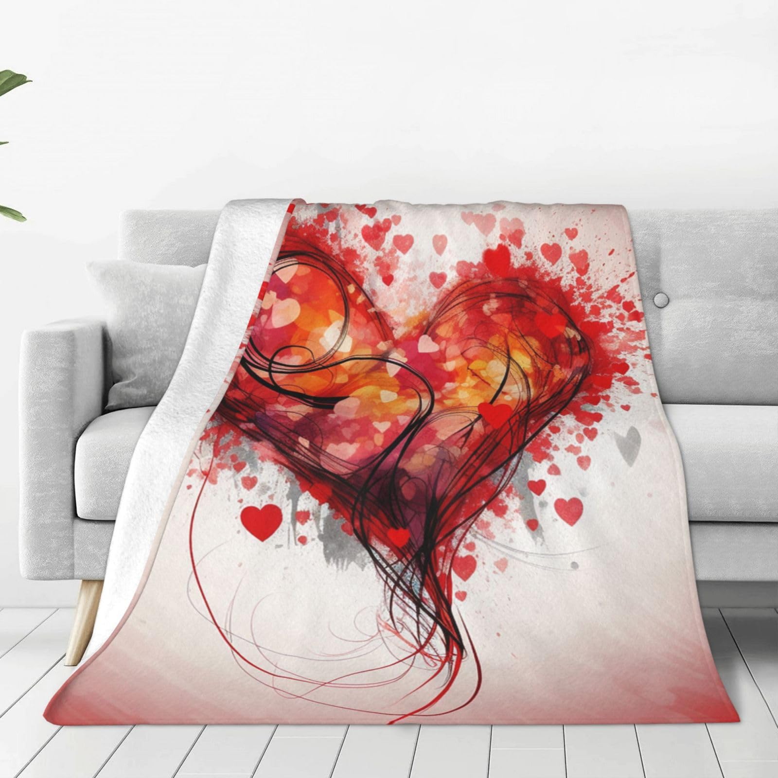 Couverture en flanelle 152x127 cm à motif cœur abstrait pour le canapé