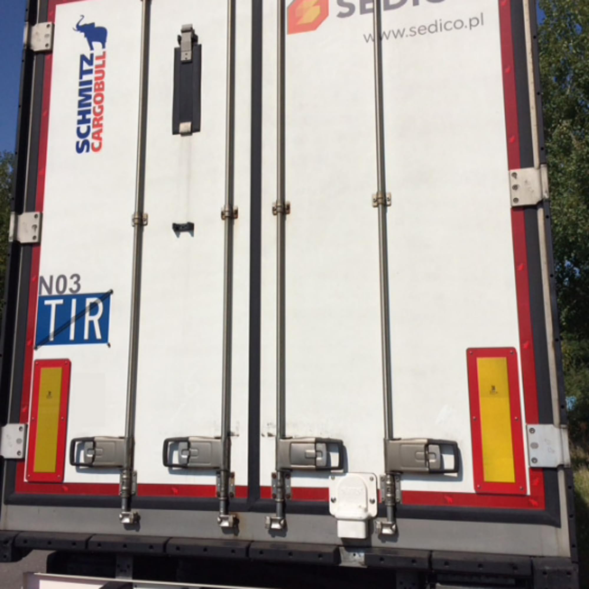PVS SBS BDL SCHMITZ blokada naczep i kontenerów bez kłódki z plandeką biała
