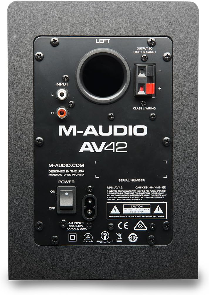 Rear view of the M-AUDIO AV42 active speaker, showing RCA inputs, speaker wire terminals, power switch, and AC input.