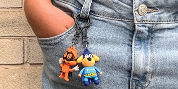 Raymond Geddes Dog Man Backpack Keychain (24 Pack)