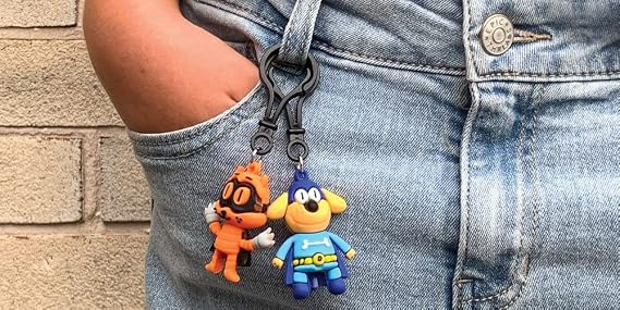 Raymond Geddes Dog Man Backpack Keychain (24 Pack)