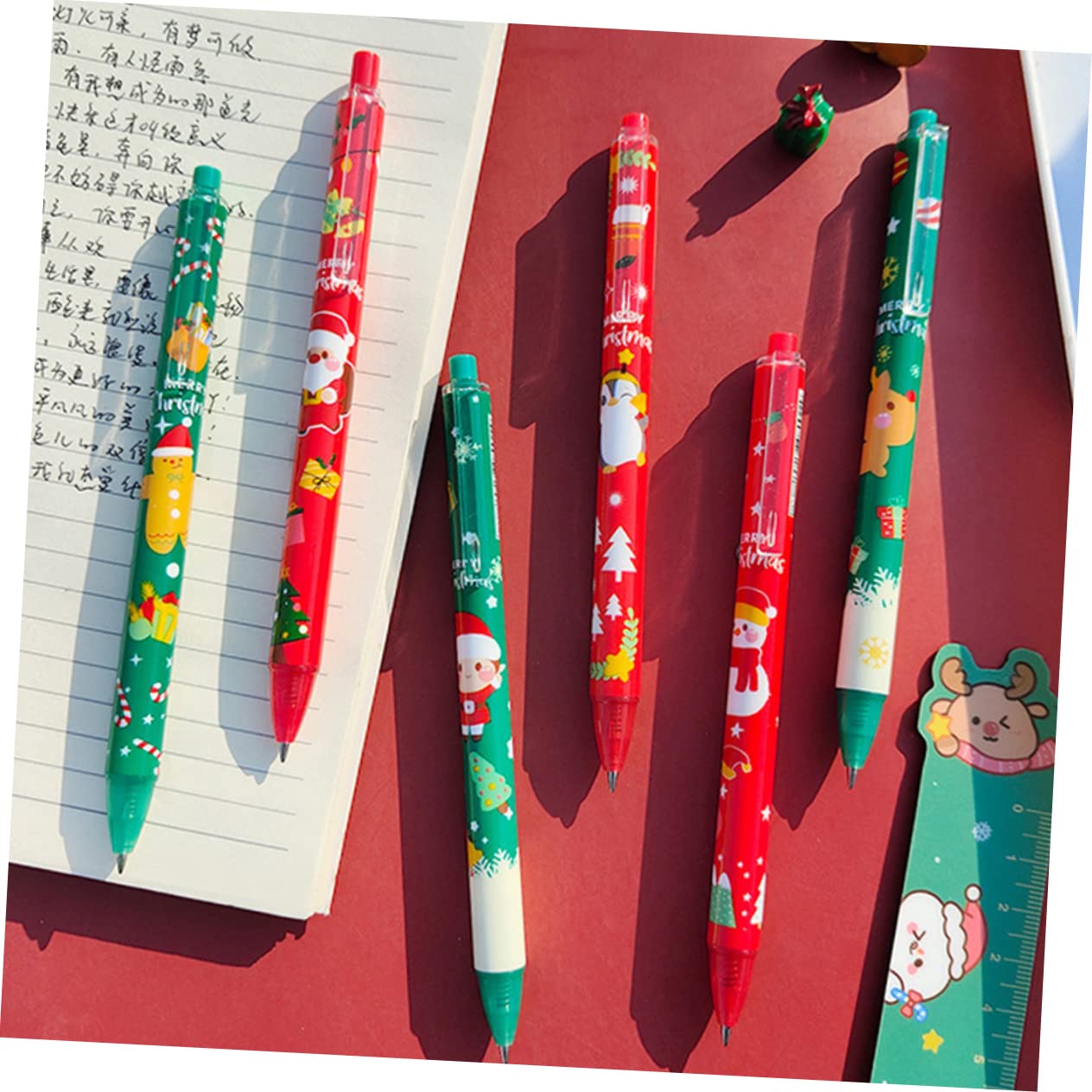 Lot de 12 Stylos à Bille de Noël à Encre Gel Noire 0,5 Mm, Plastique, Écriture Fluide et Facile, Papeterie Adorable pour Étudiants et Fêtes de Noël Plusieurs styles