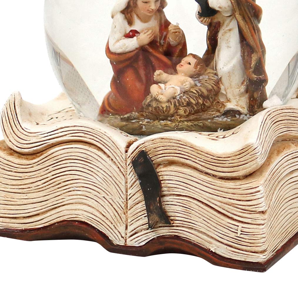 Schneekugel mit Heilige Familie auf Buch, Maße H/B/Ø Kugel: ca. 9 x 7,5 cm/Ø 6,5 cm.