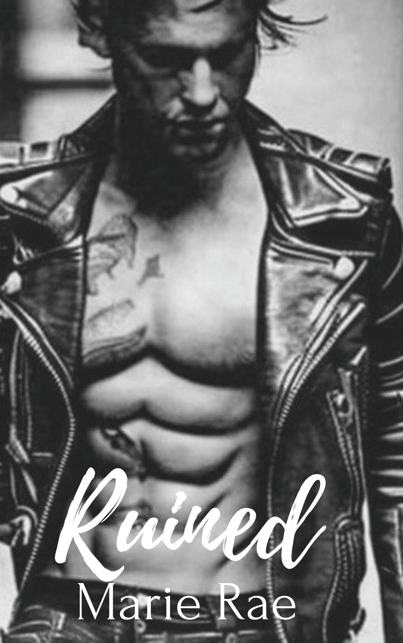 Ruined: An Enemies to Lovers Rockstar Romance