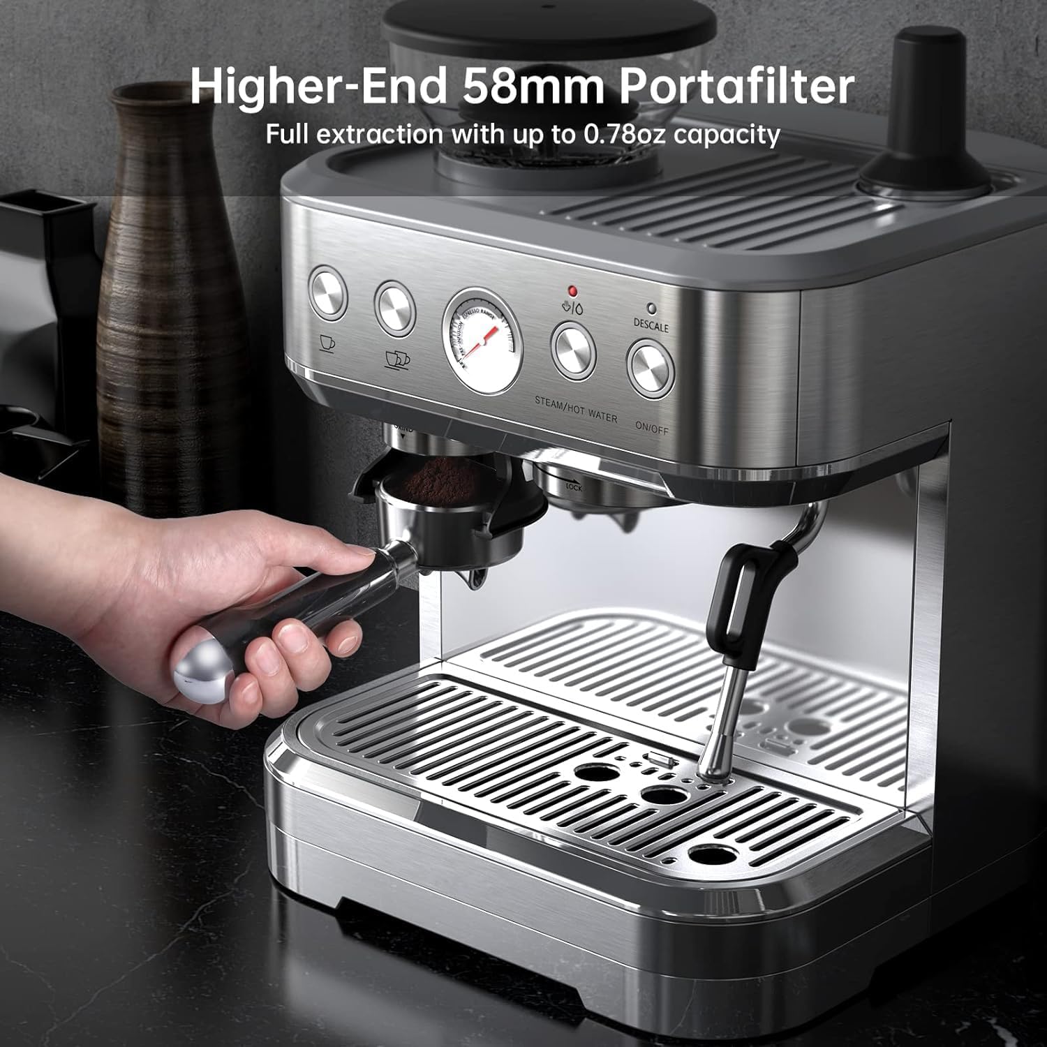 Inserting the 58mm portafilter into the espresso machine