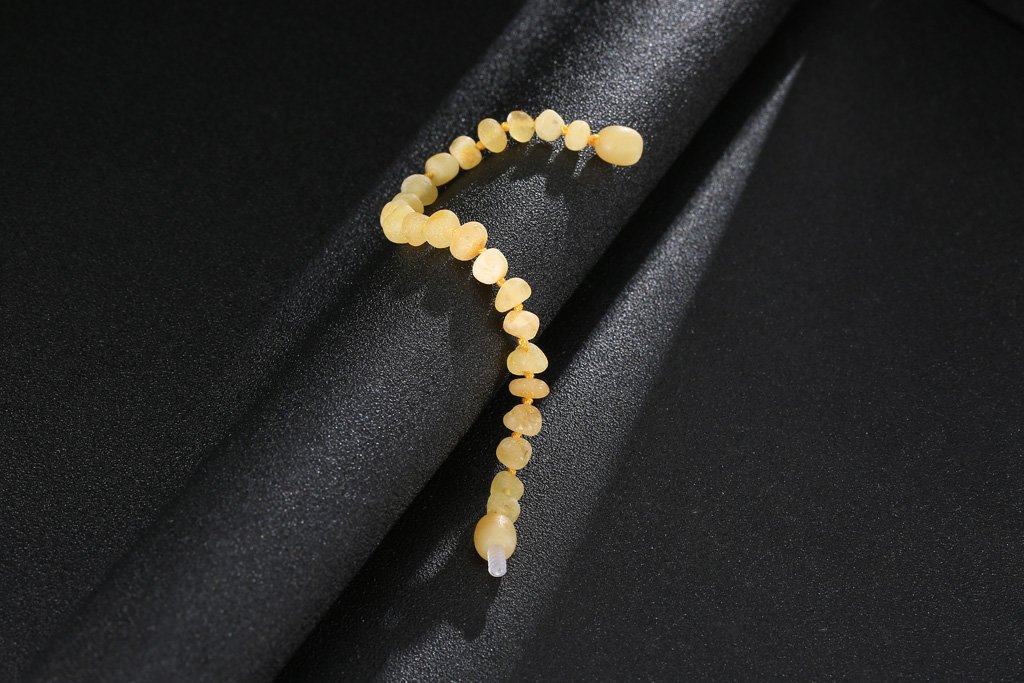 Baltic Amber Bracelet(Unisex)(Butterscotch Raw)(5.5 Inches) - Knotted Between Beads - Handmade Jewelry: Beauty