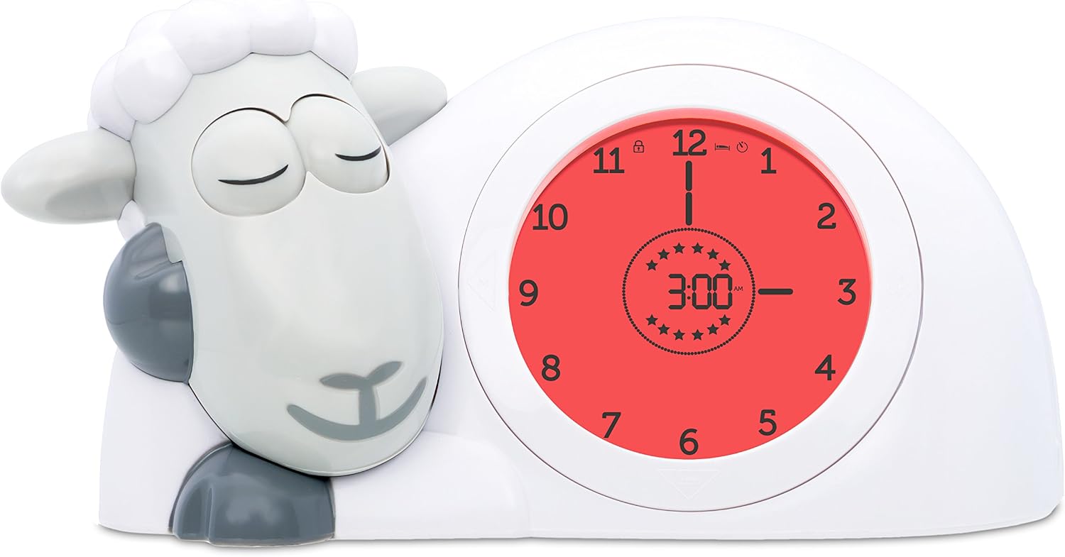 ZAZU Sam the Sheep clock with red display and closed eyes, indicating sleep time