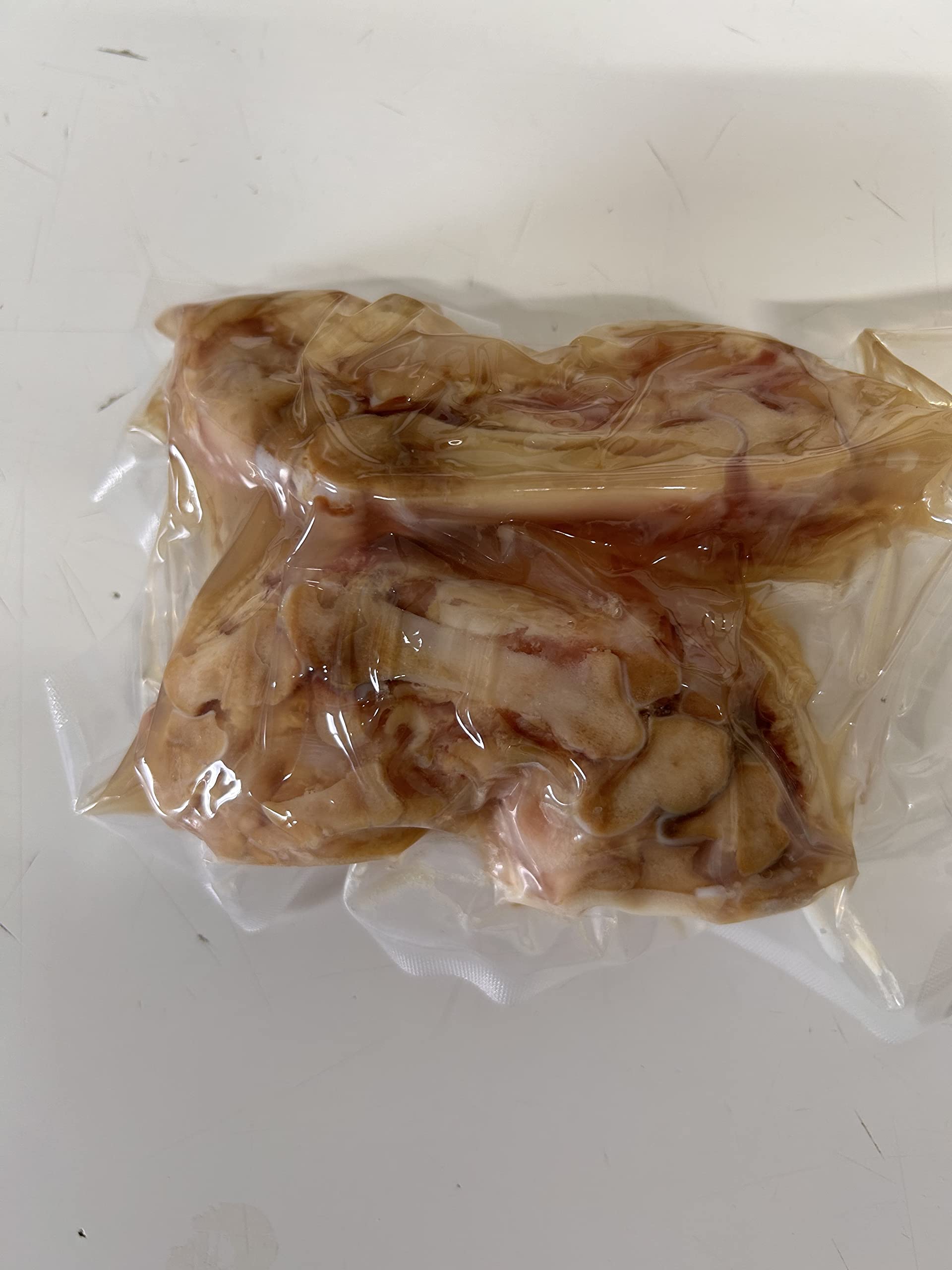 Manitas de cerdo cocidas en su jugo 12 piezas