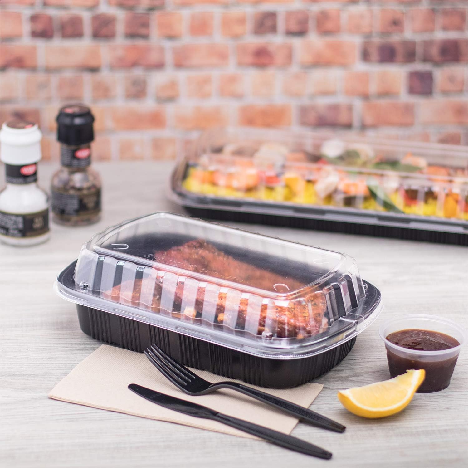Karat Half Slab Black PP Plastic Rib Container with Clear OPS lid - 100 ct