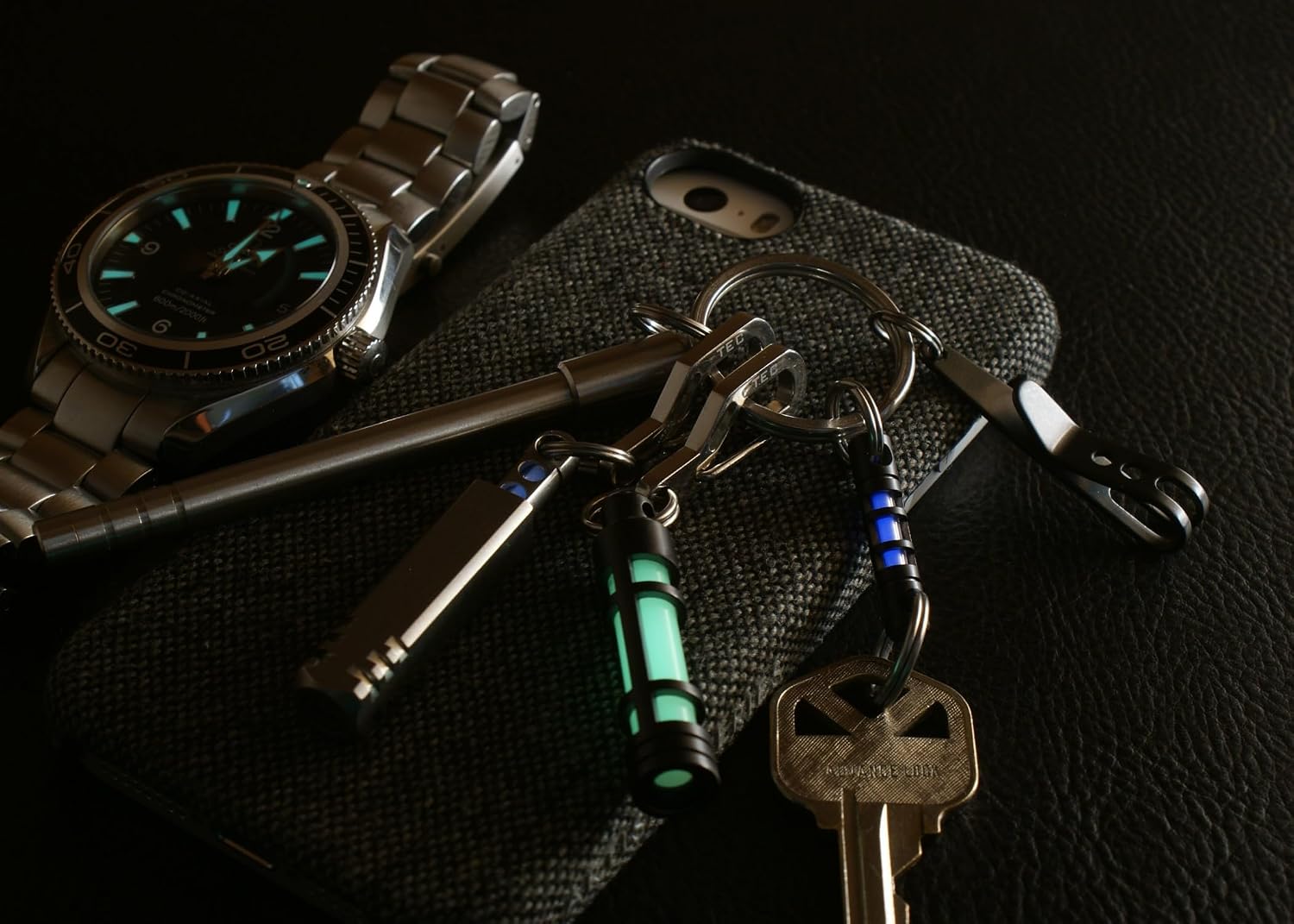 TEC Accessories Embrite Glow Fob - Stainless Steel, Green Embrite Pellet - Black Diamond Carbon Coating - Glow in the Dark Keychain Accessories - Everyday Carry Key Fob Keychain
