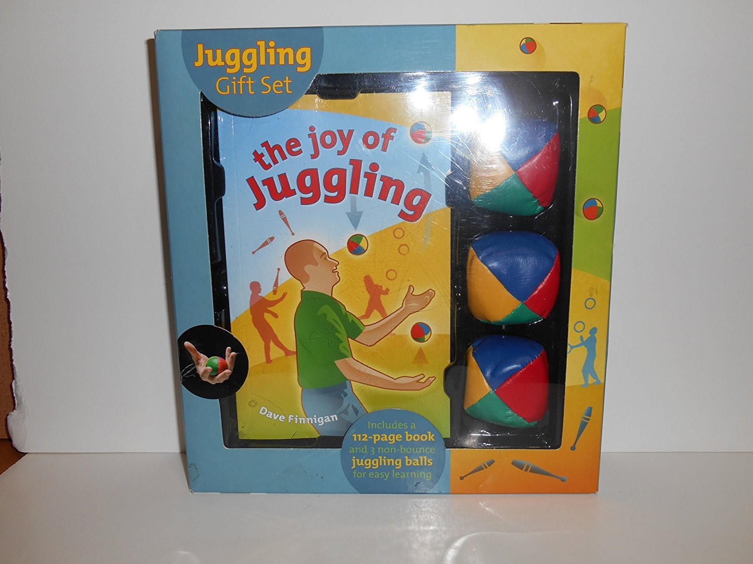 the joy of Juggling - includes a 112 - page book and 3 non-bounce juggling balls for easy learning by Dave Finnigan