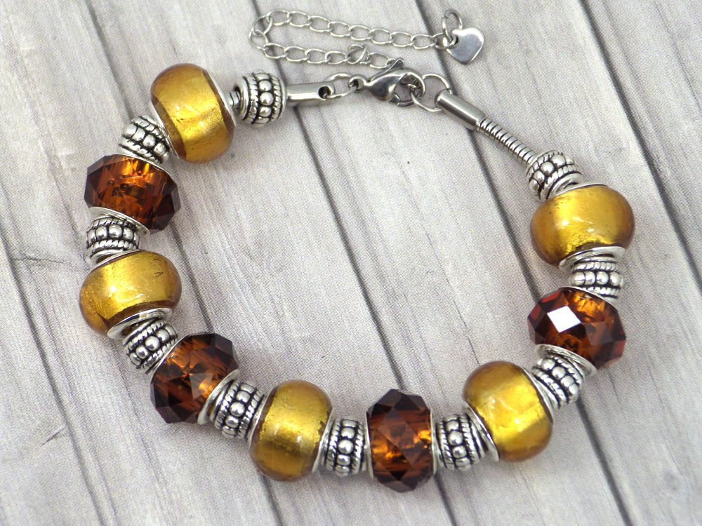 Pulsera de Charms de mujer Thurcolas Modelo Manhattan Acero Inoxidable con Cuentas de color Oro en Vidrio