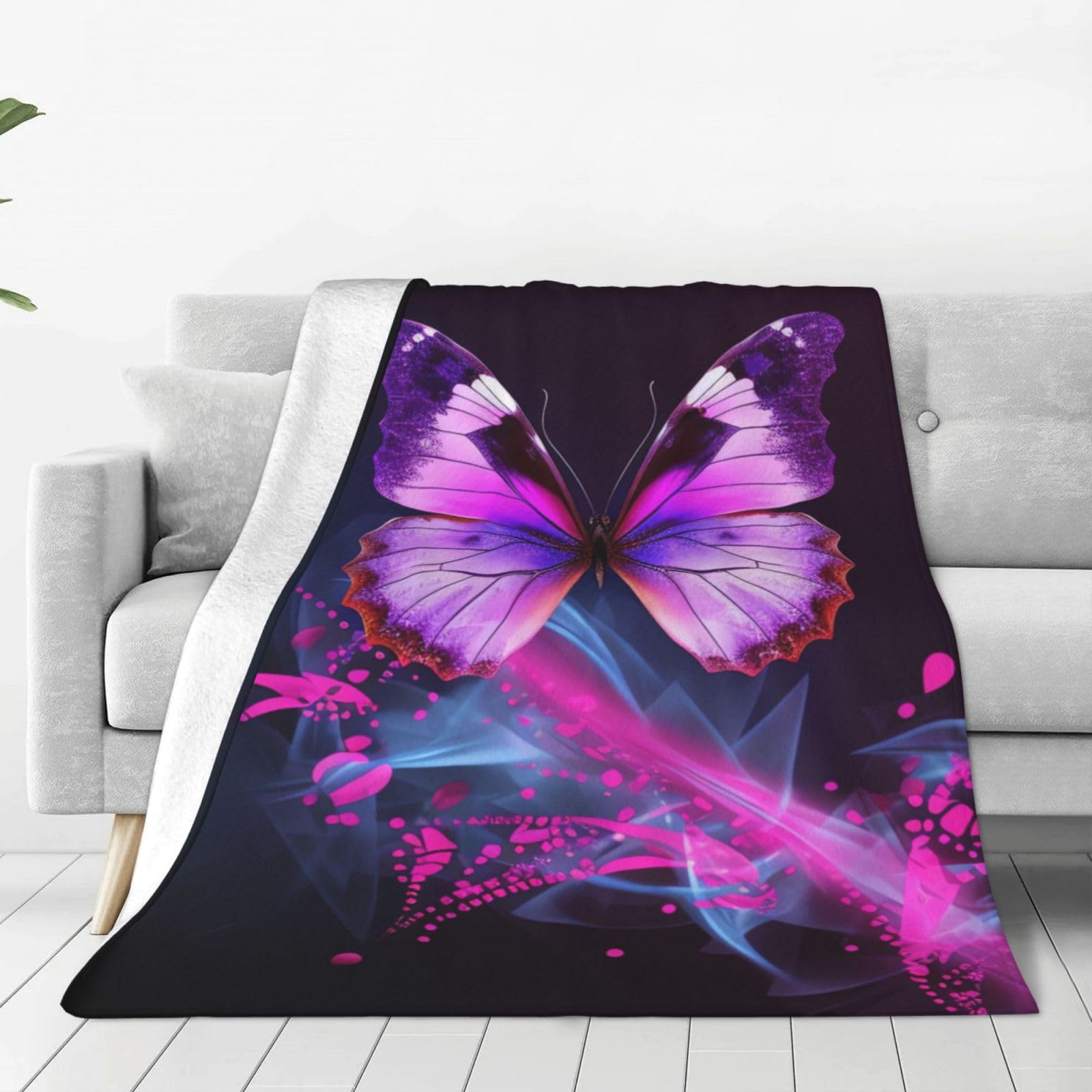 Couverture polaire rose motif papillon, l'idée cadeau confort parfaite